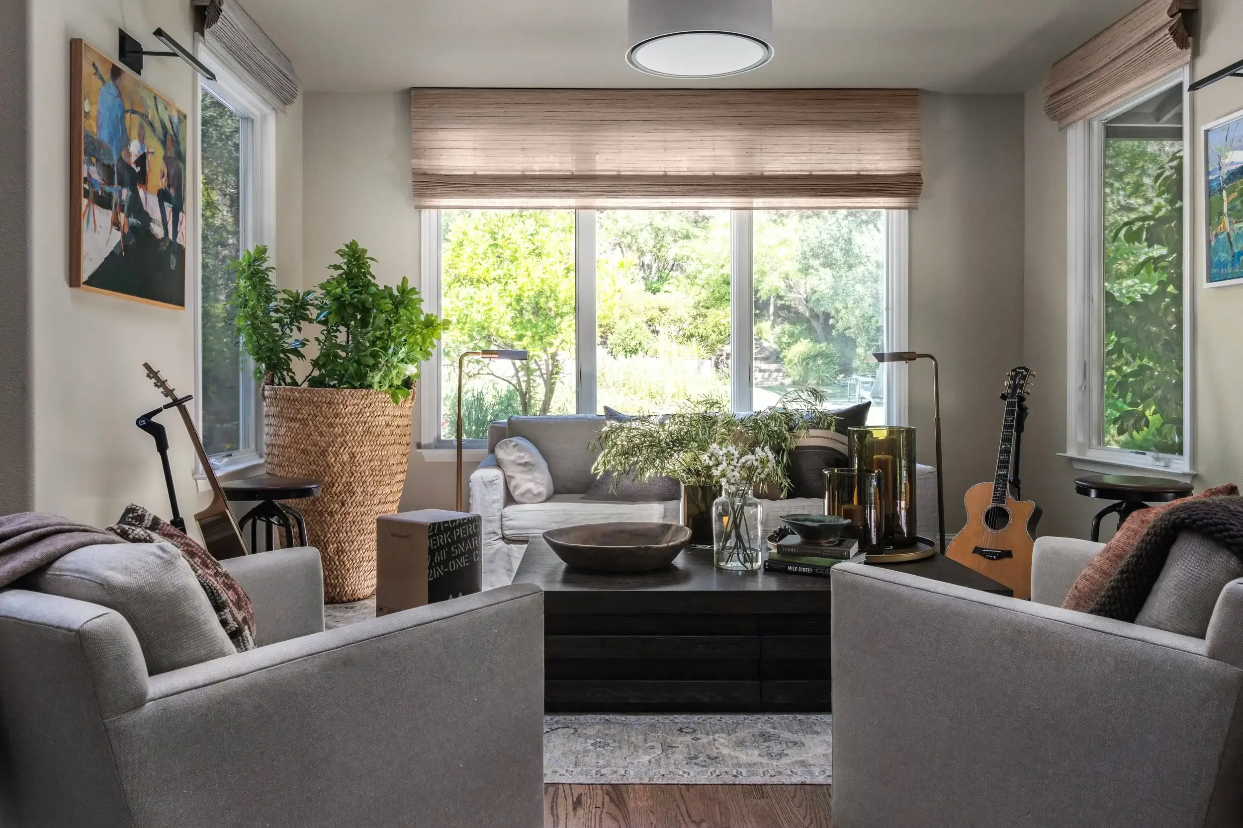 a-living-room-with-a-couch-table-and-a-window.webp