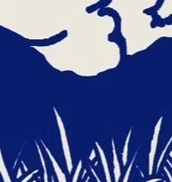 A graphic image of mountains against clouds.