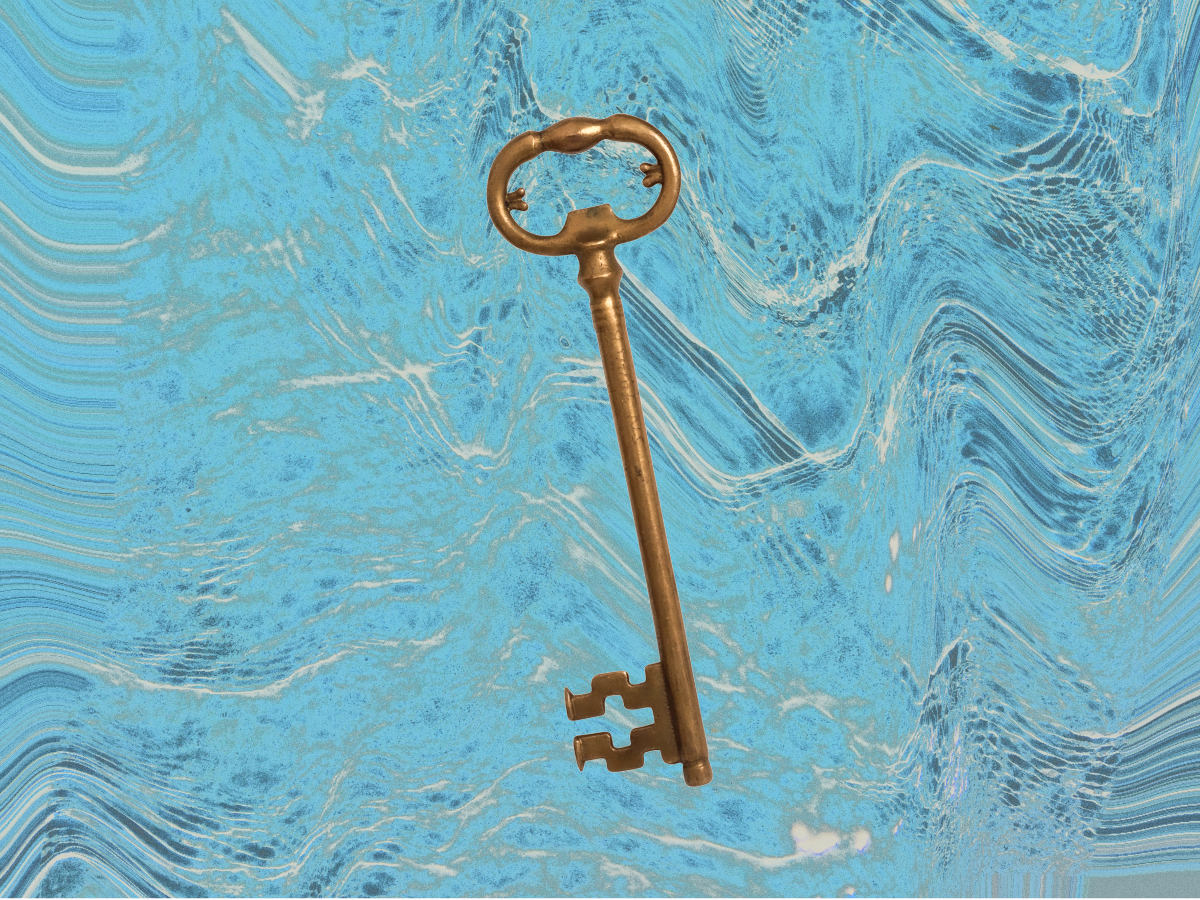 A gold key against a wavy blue background.
