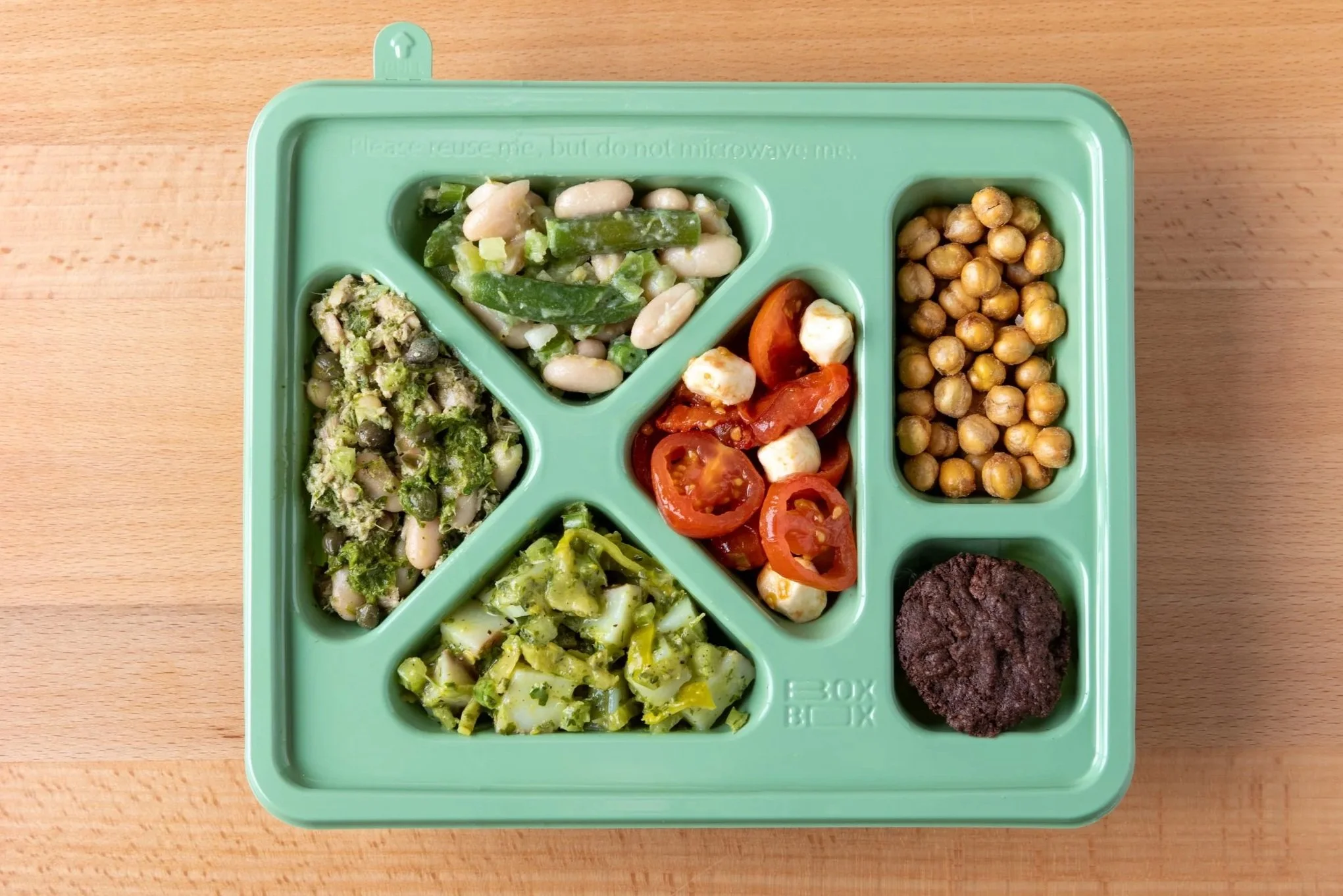 Bento Boxes feature 4 salads, crackers and brownie
