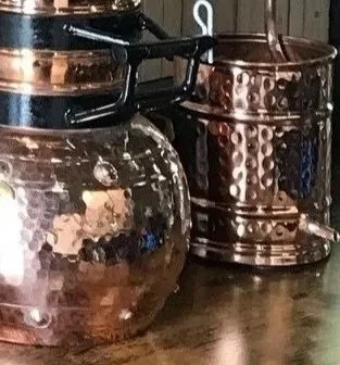 five-litre alembic copper with black handles for gin distilling
