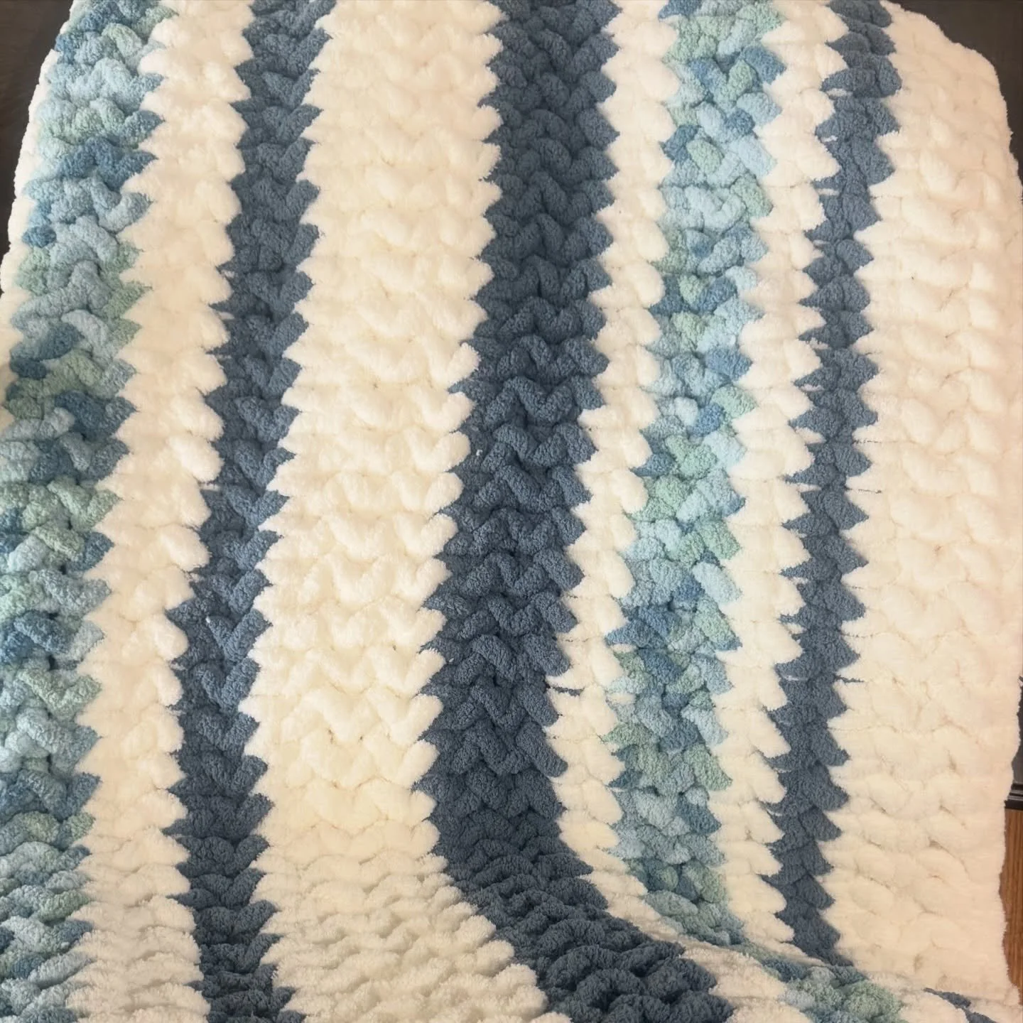 Now available! Hand knit blanket 🩵💙🤍