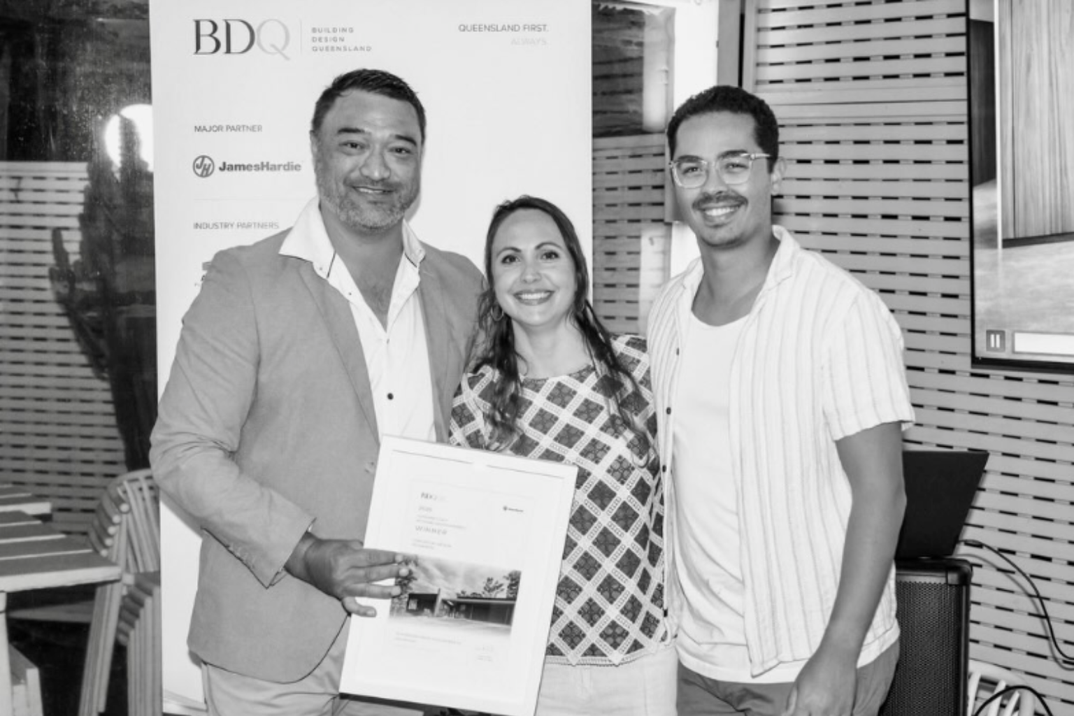 Iziko Designs team with their 2026 Building Design Queensland Sunshine Coast Regional Design Award for 16 Horizons Drive