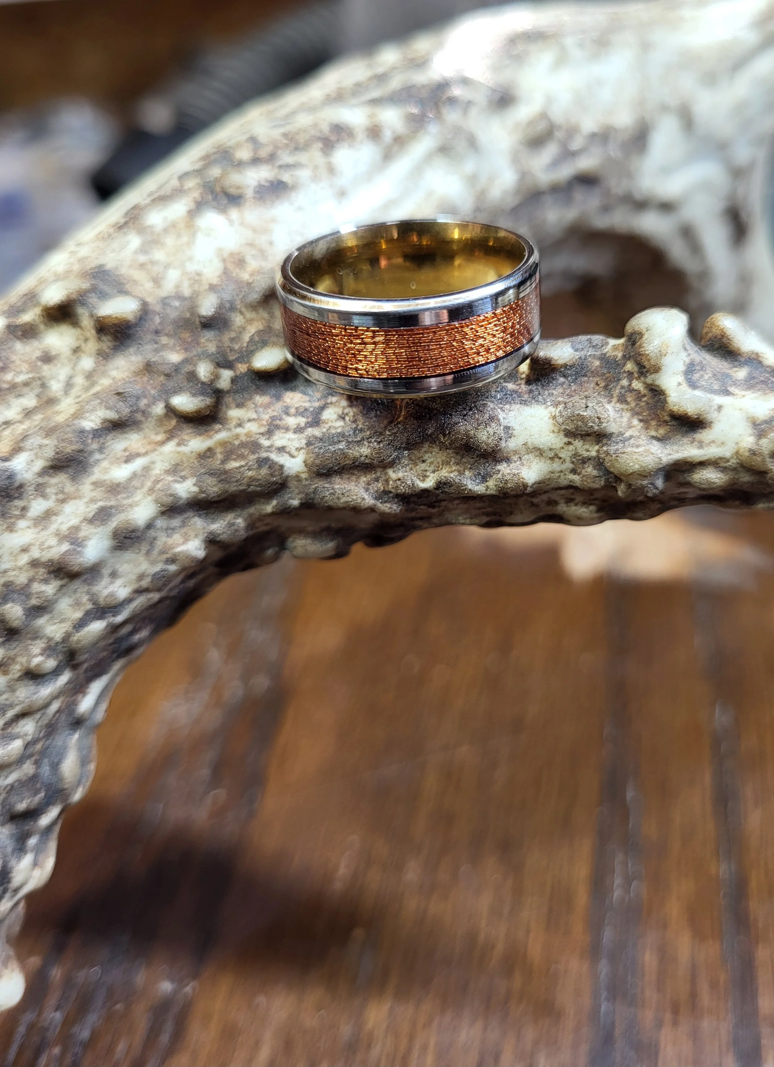 Copper & Stainless
A durable stainless steel core that is intricately spooled with a fine copper thread, ensuring both strength and elegance in design. Other colored thread options are readily available.