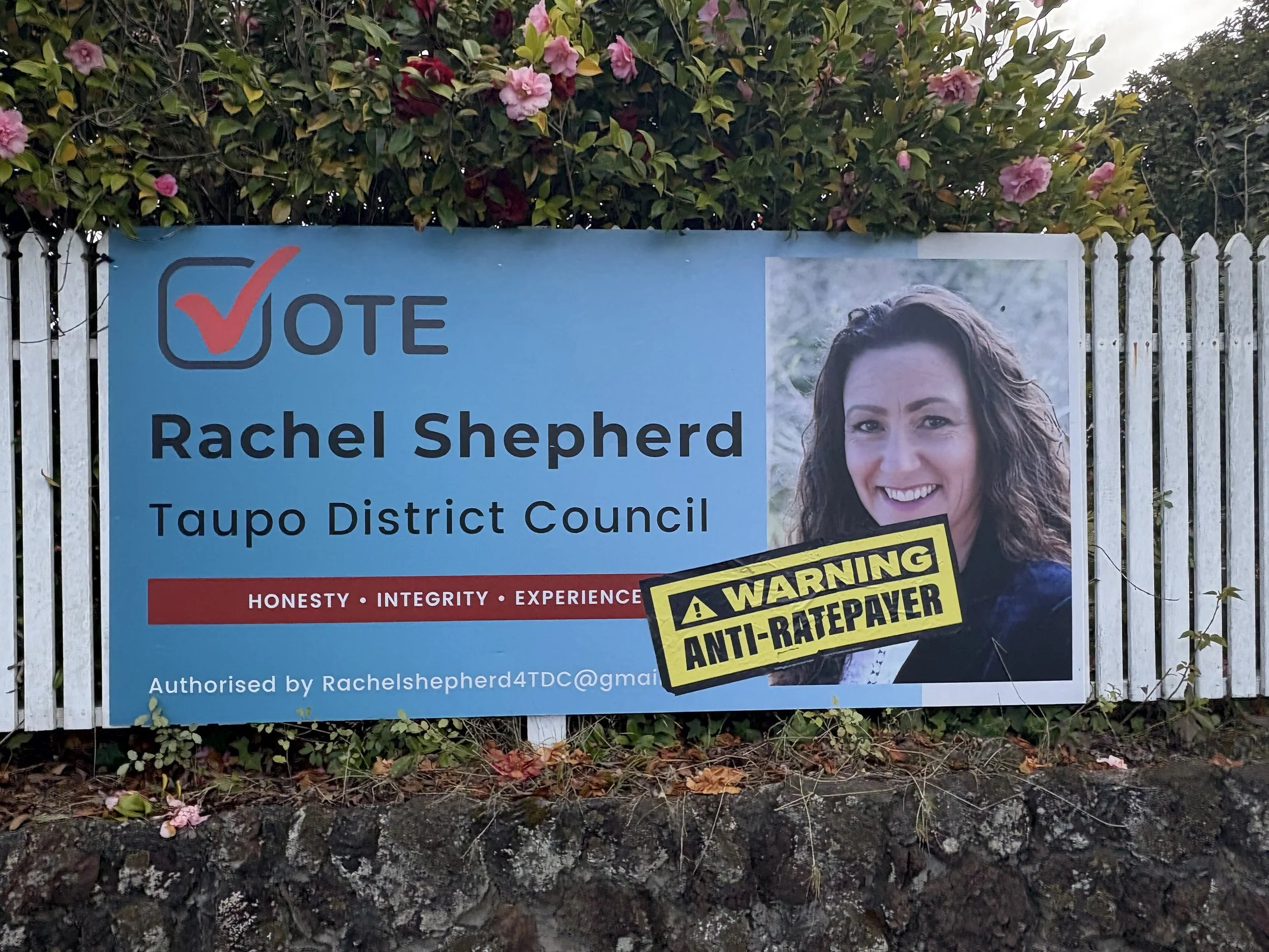 Sneaky stickers rankle candidates