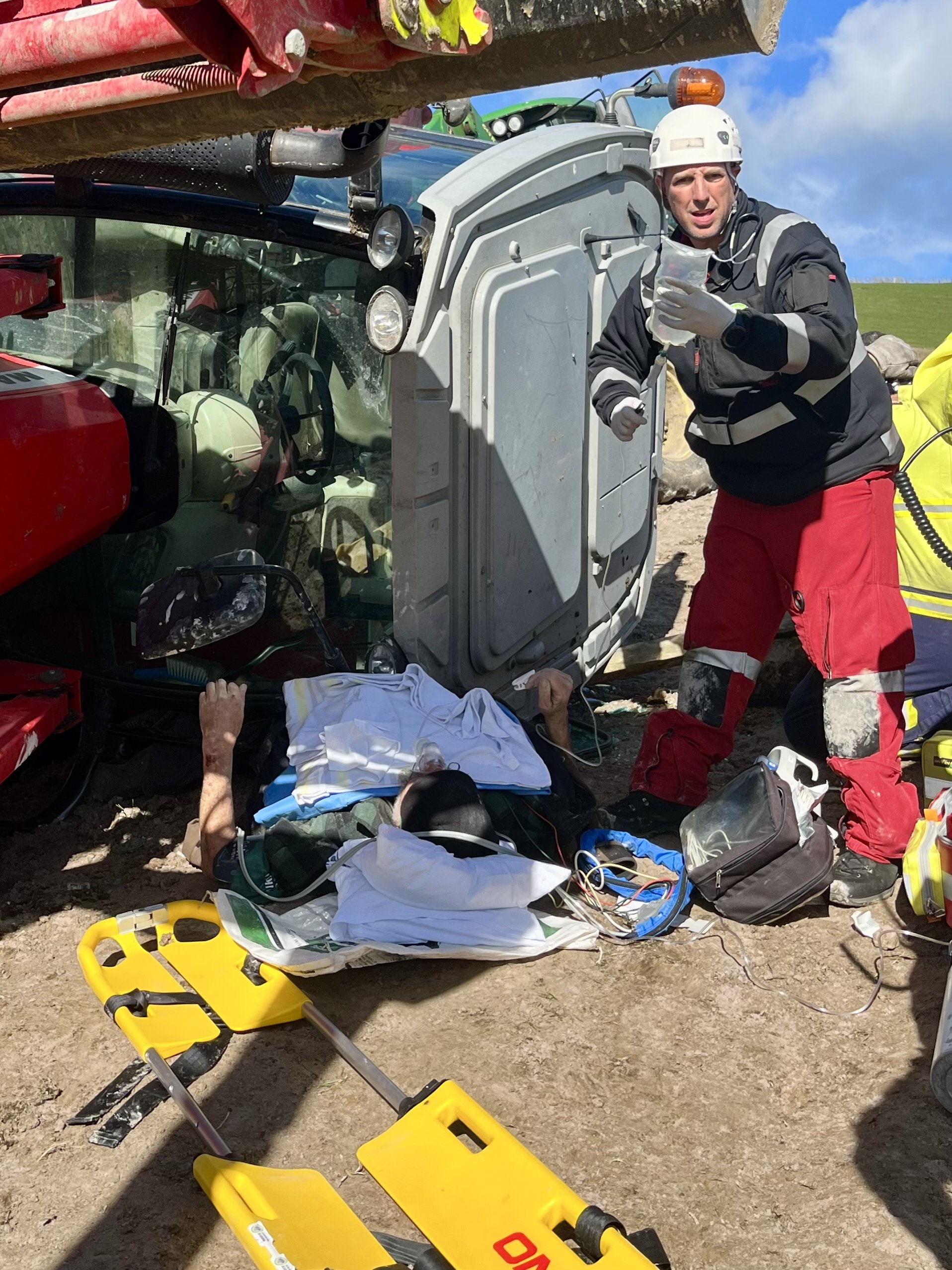 Survivor recalls hours trapped under a tractor