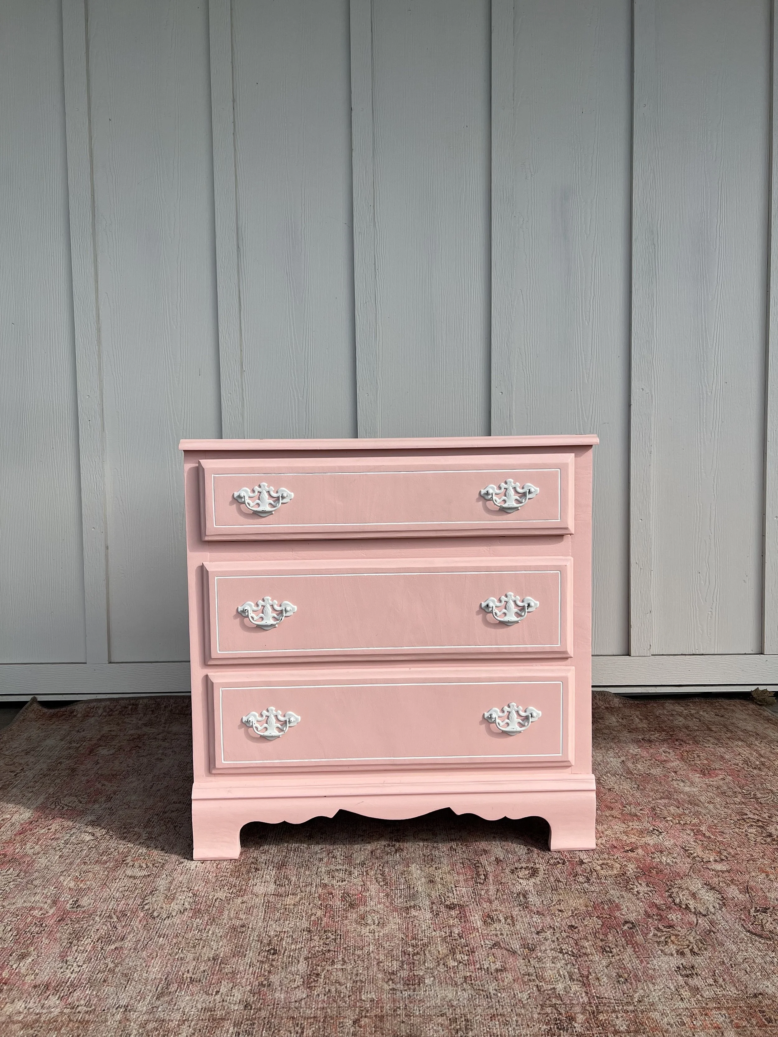 Vintage Pink Dresser
Measures approximately: 18” Width x 41.5” Length x 43” Tall