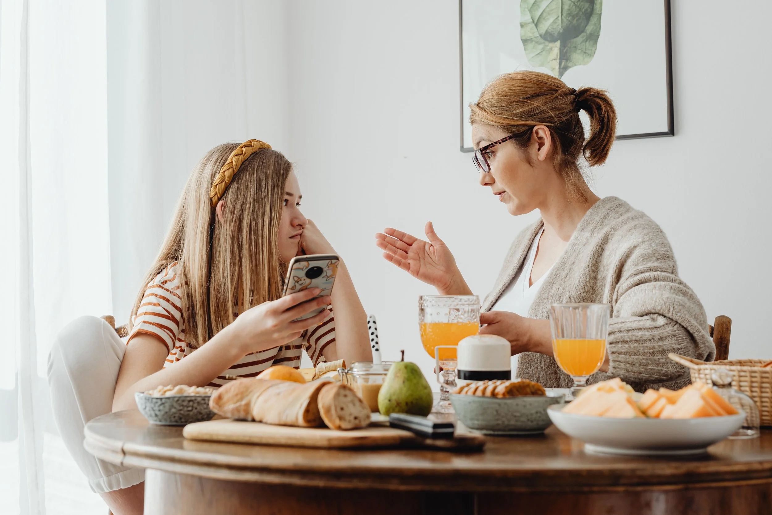 Mom talking to teen daughter