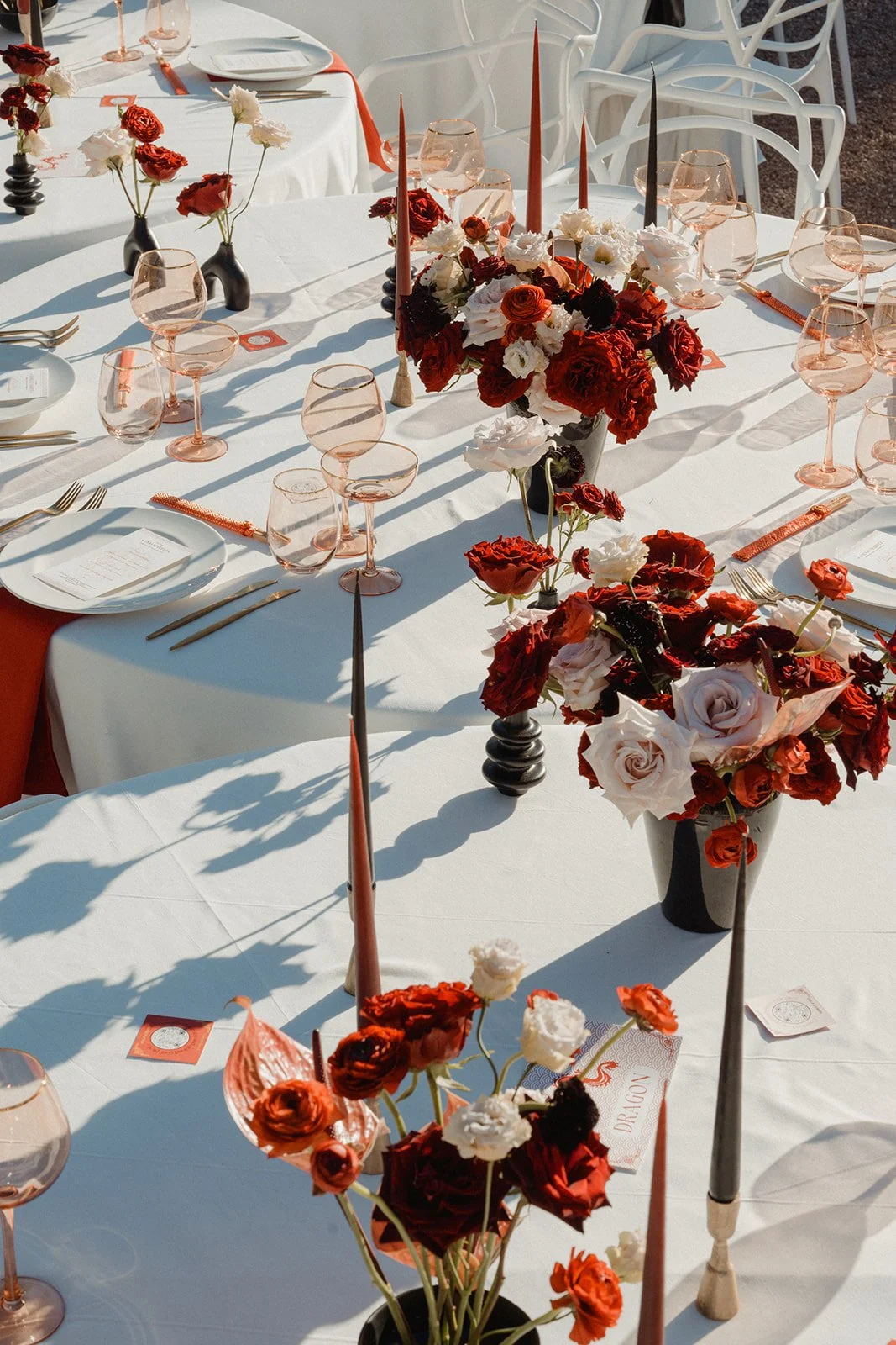 Vibrant reception styling with red and pink florals by Aurea, Ca Na Xica Ibiz