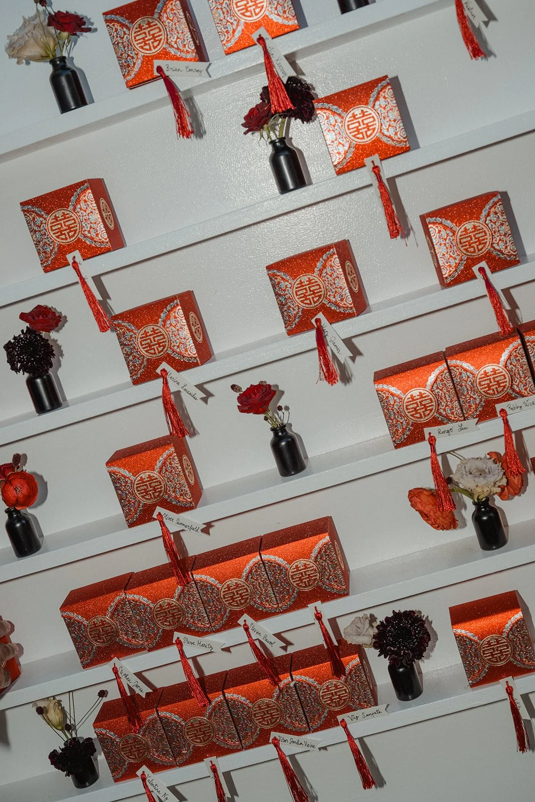 Custom fortune cookie table plan display at Chinese fusion wedding