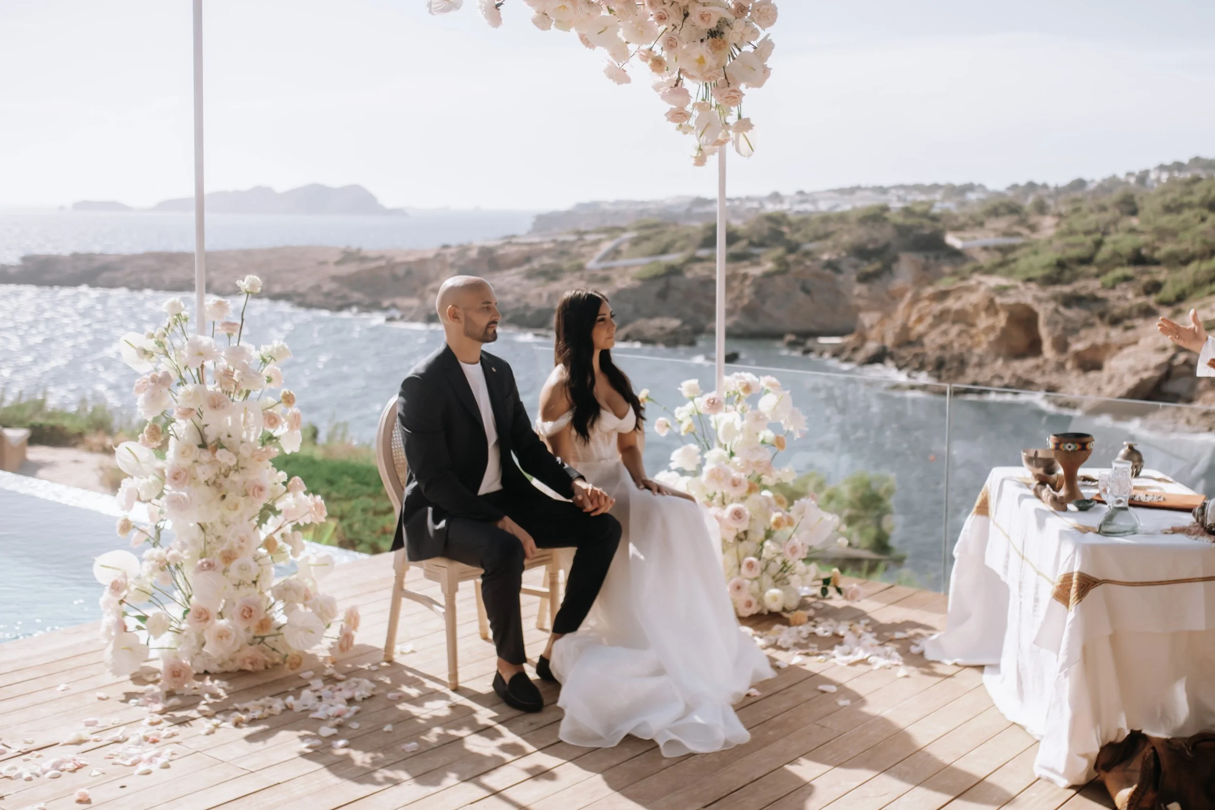 Luxury outdoor ceremony overlooking Mediterranean Sea, June wedding Ibiza