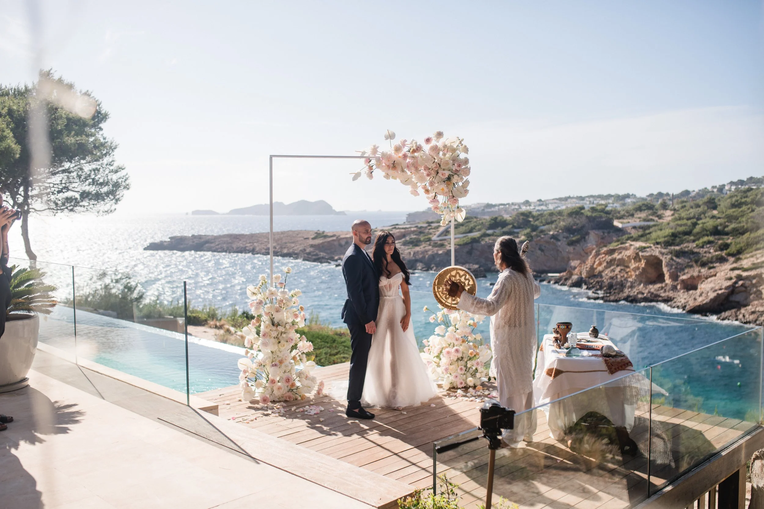 Luxury outdoor ceremony overlooking Mediterranean Sea, June wedding Ibiza