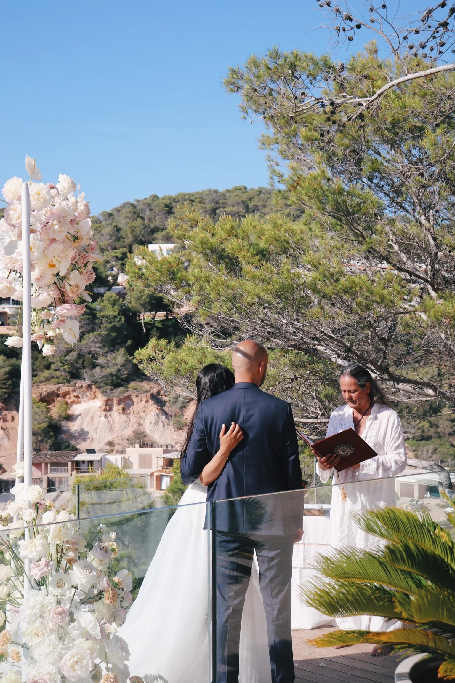 Luxury outdoor ceremony overlooking Mediterranean Sea, June wedding Ibiza