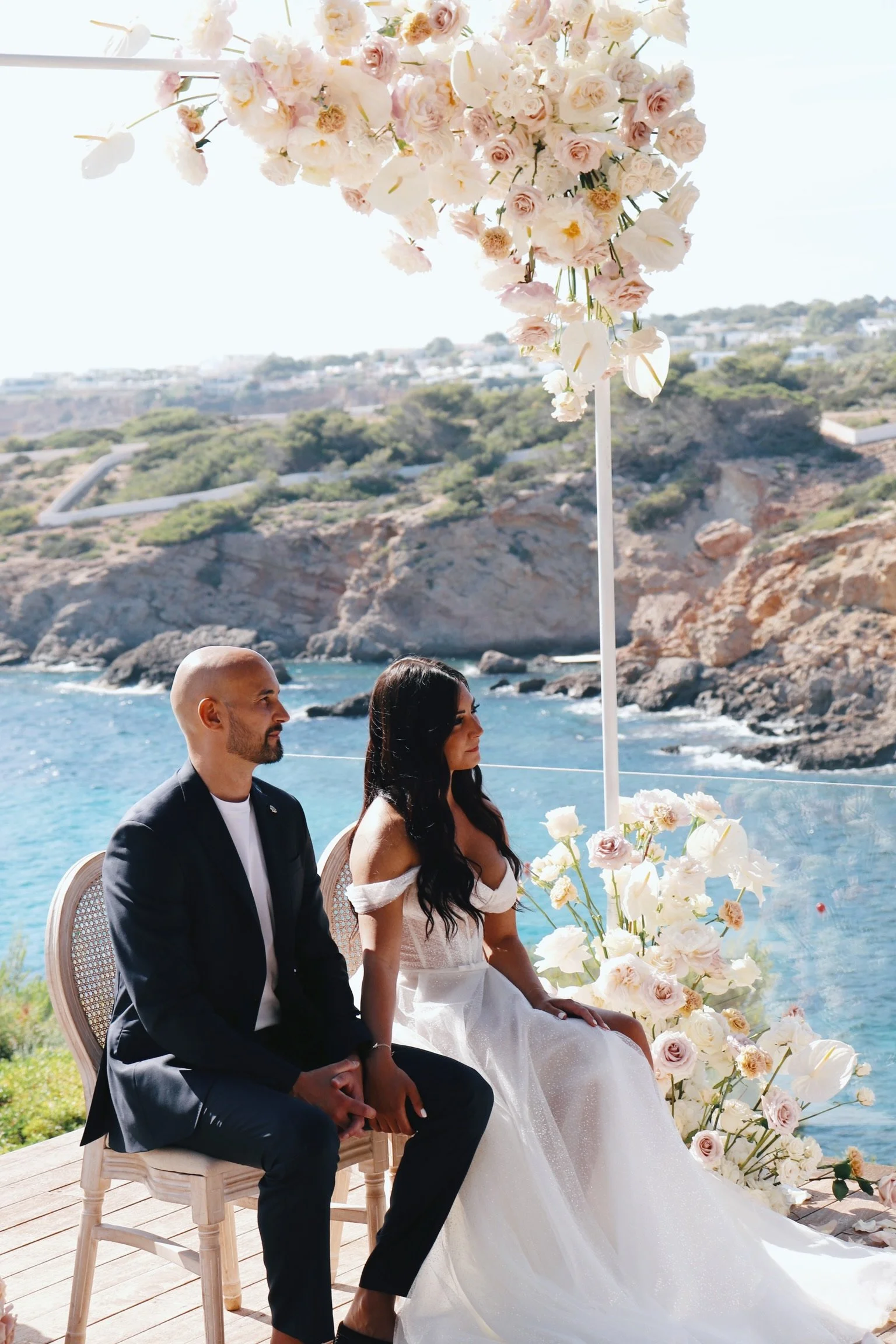 Luxury outdoor ceremony overlooking Mediterranean Sea, June wedding Ibiza