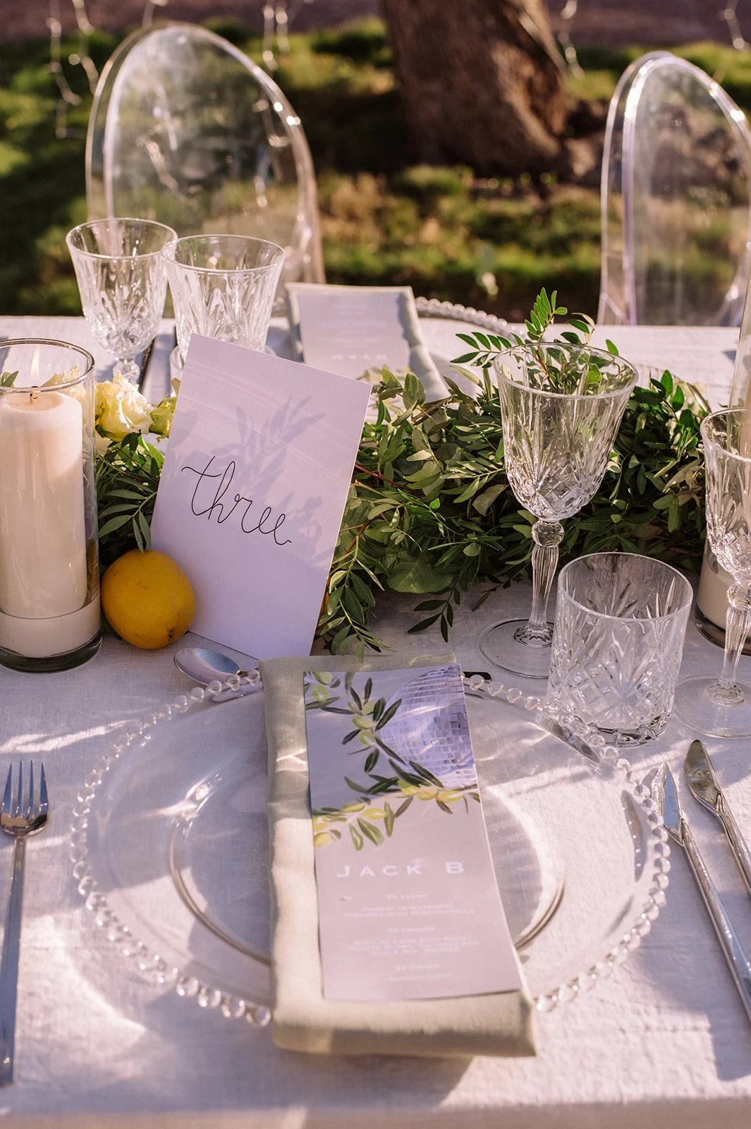 Ibiza wedding reception , stylish tables with festoon lighting and olive trees