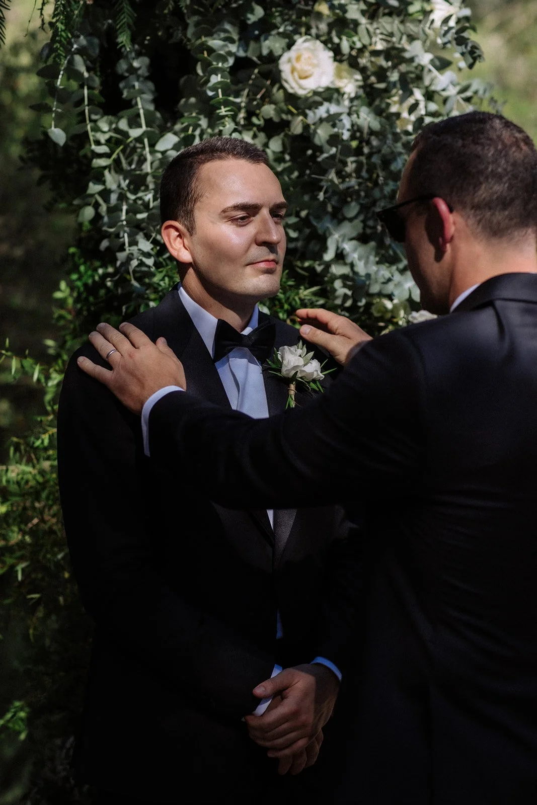 Stylish outdoor wedding ceremony in Ibiza countryside, lush floral arrangements by Aurea