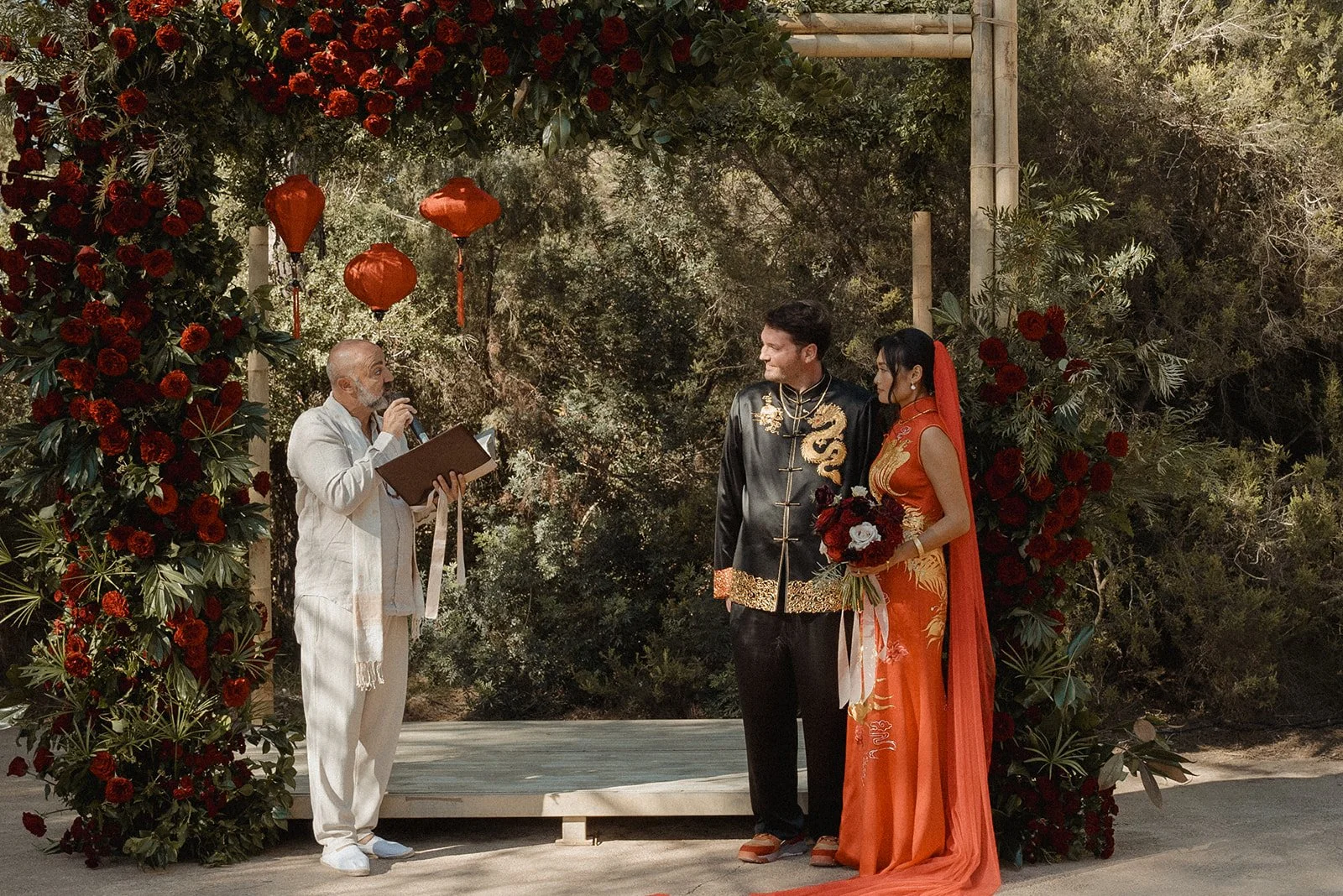 Couple exchanging vows at cultural fusion wedding, Ca Na Xica Ibiza