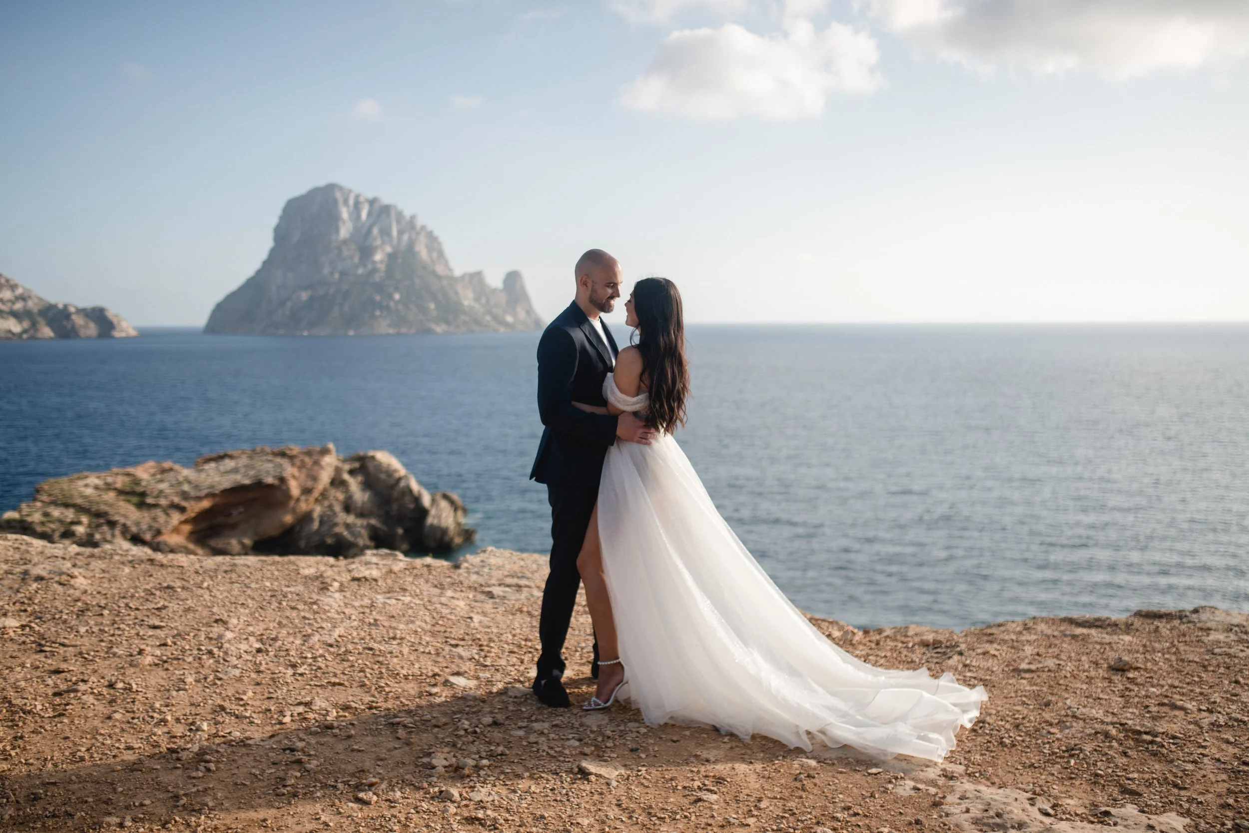 Couple portrait at Es Vedrà during vow renewal ceremony, Ibiza Spain