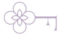 A stylized, decorative key with an ornate, flower-shaped bow and a simple, straight shaft.