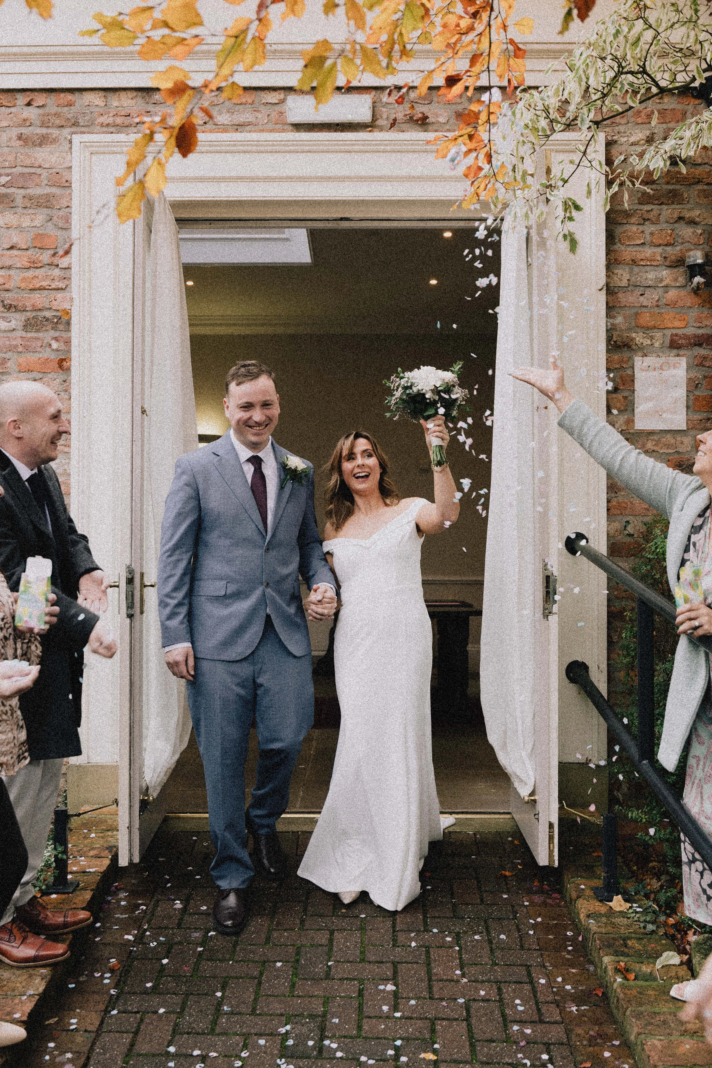  throwing confetti. york registry office wedding 