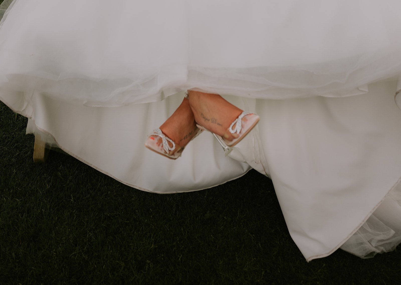 Wedding dress with visible high-heeled shoes under the hem, Merrydale Manor Wedding Venue weddings