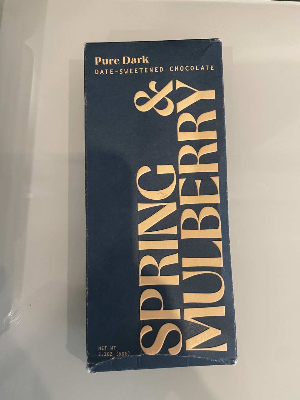 A luxurious one - Dark chocolate reimagined with whole ingredients like dates, nuts, and flowers. No refined sugars—just a rich, naturally sweet experience.