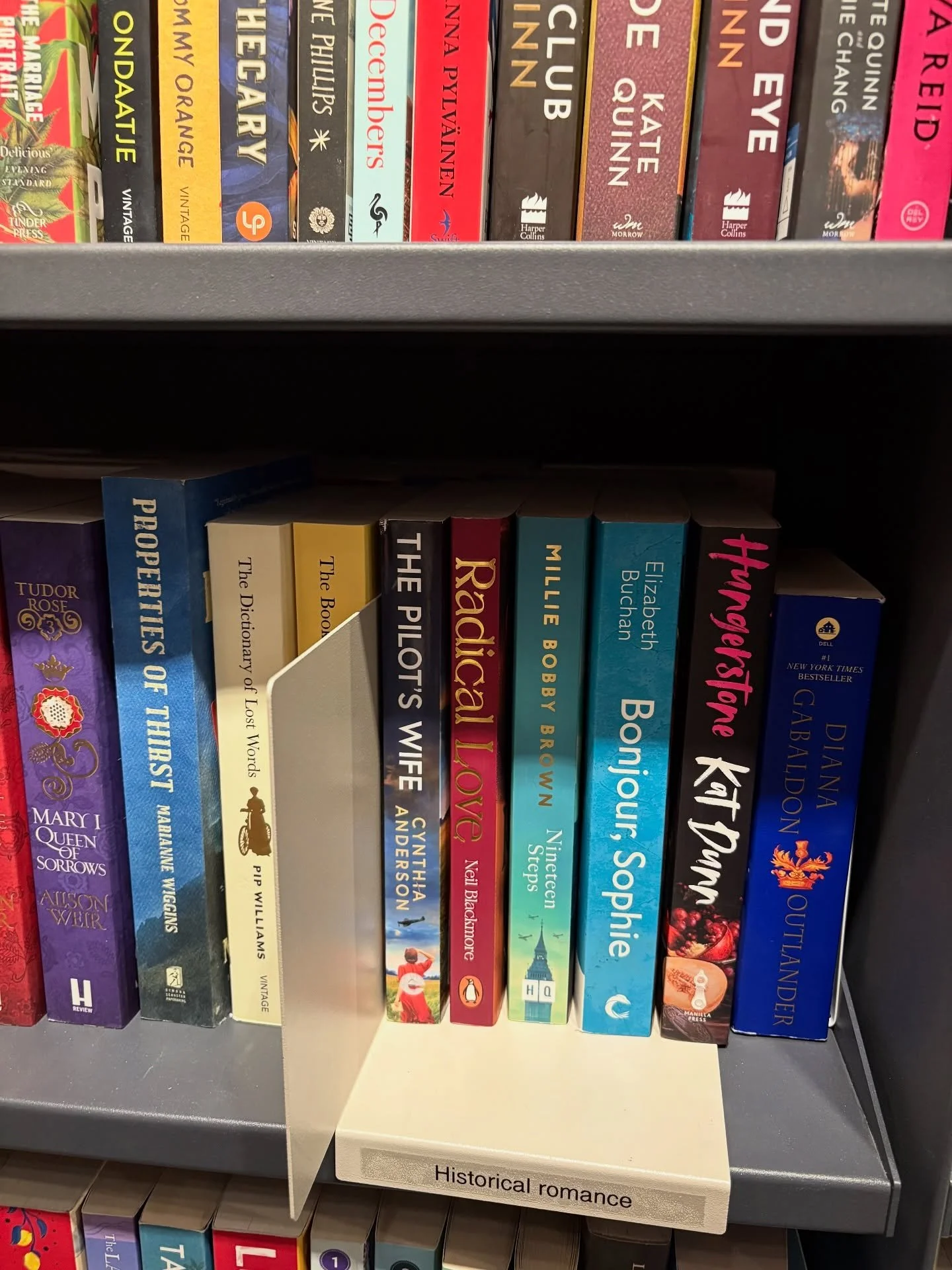 Browsing the shelves of the English language section of Payot bookstore in Geneva, I spied The Pilot&rsquo;s Wife on a bottom shelf!! Thank you to whom ever requested it! Another great way to support writers is to request their books at your favorite