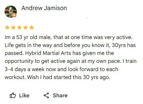Screenshot of a Google review from Andrew Jamison, 5 stars, describing his experience with hybrid martial arts and his fitness routine.