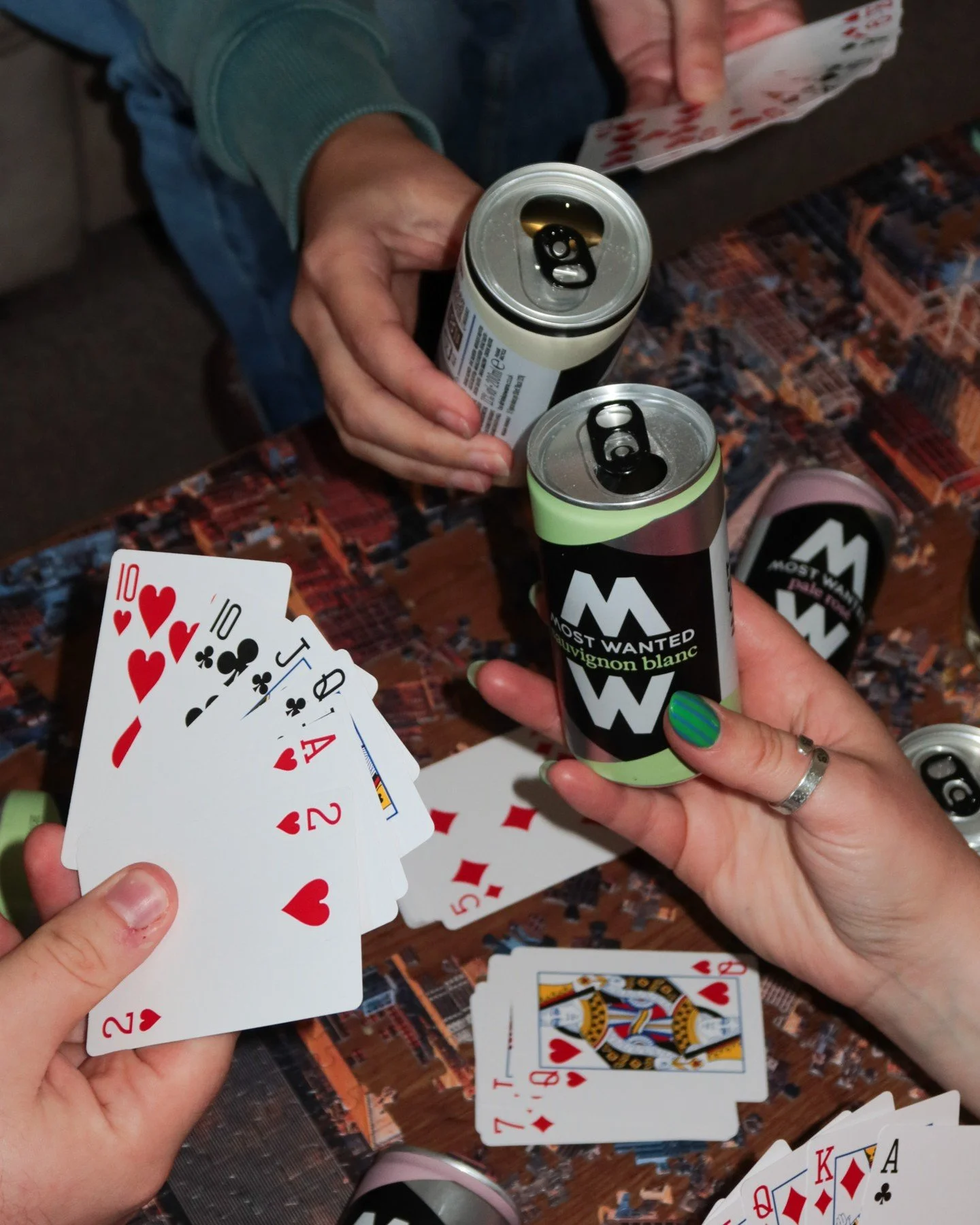 Cards on the table. Cans in hand. 🍷🃏 
Game night, upgraded.
