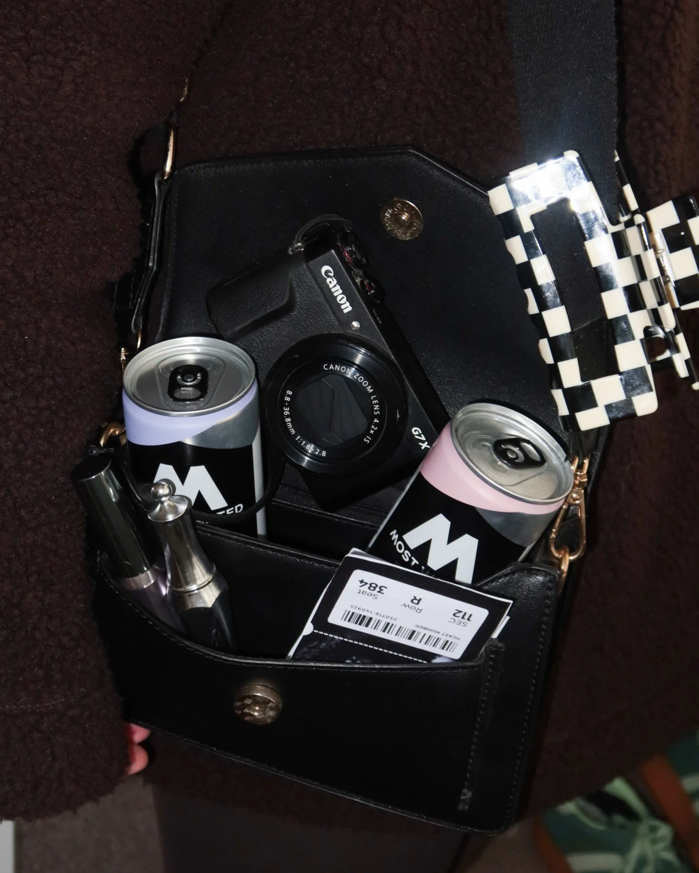 Gig plans?
Cans, snaps and tickets, in the bag. 🍷