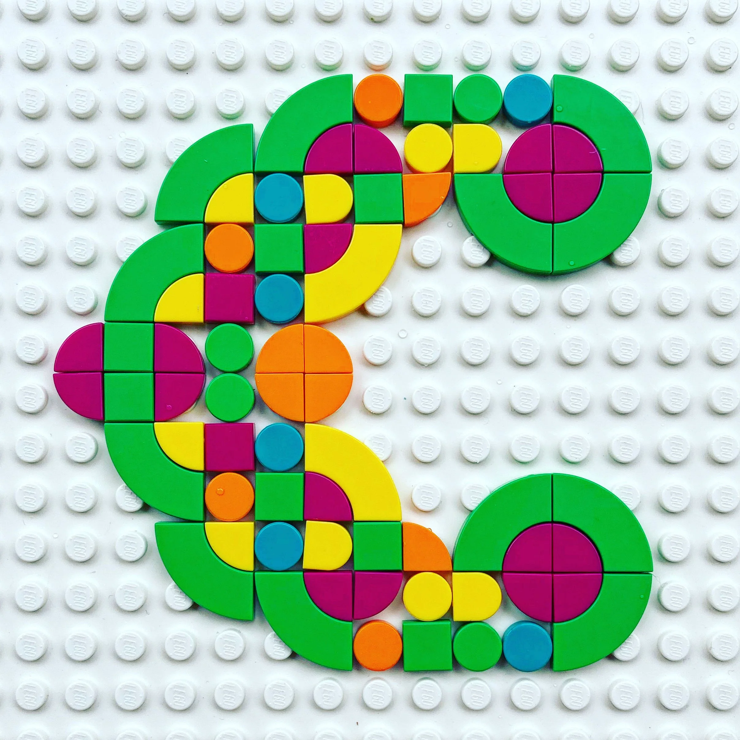 Curvey letter 'C' constructed out of Lego.