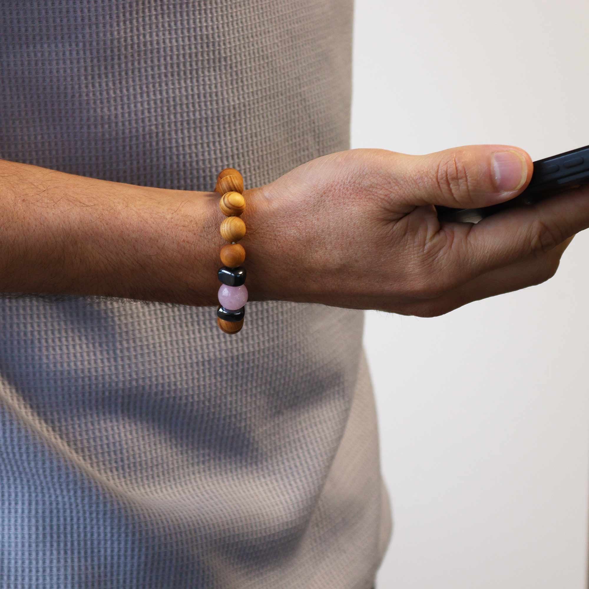 Cedarwood Heart Chakra Bracelet with Rose Quartz on wrist.jpeg