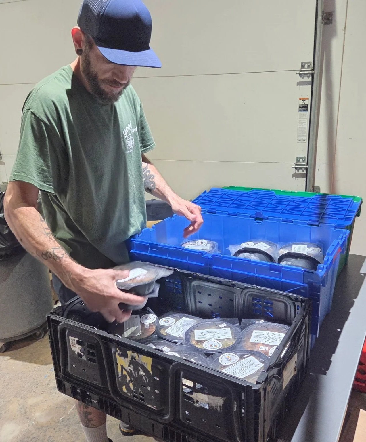Steve of Equiti Foods organizing donated Good Bowls.