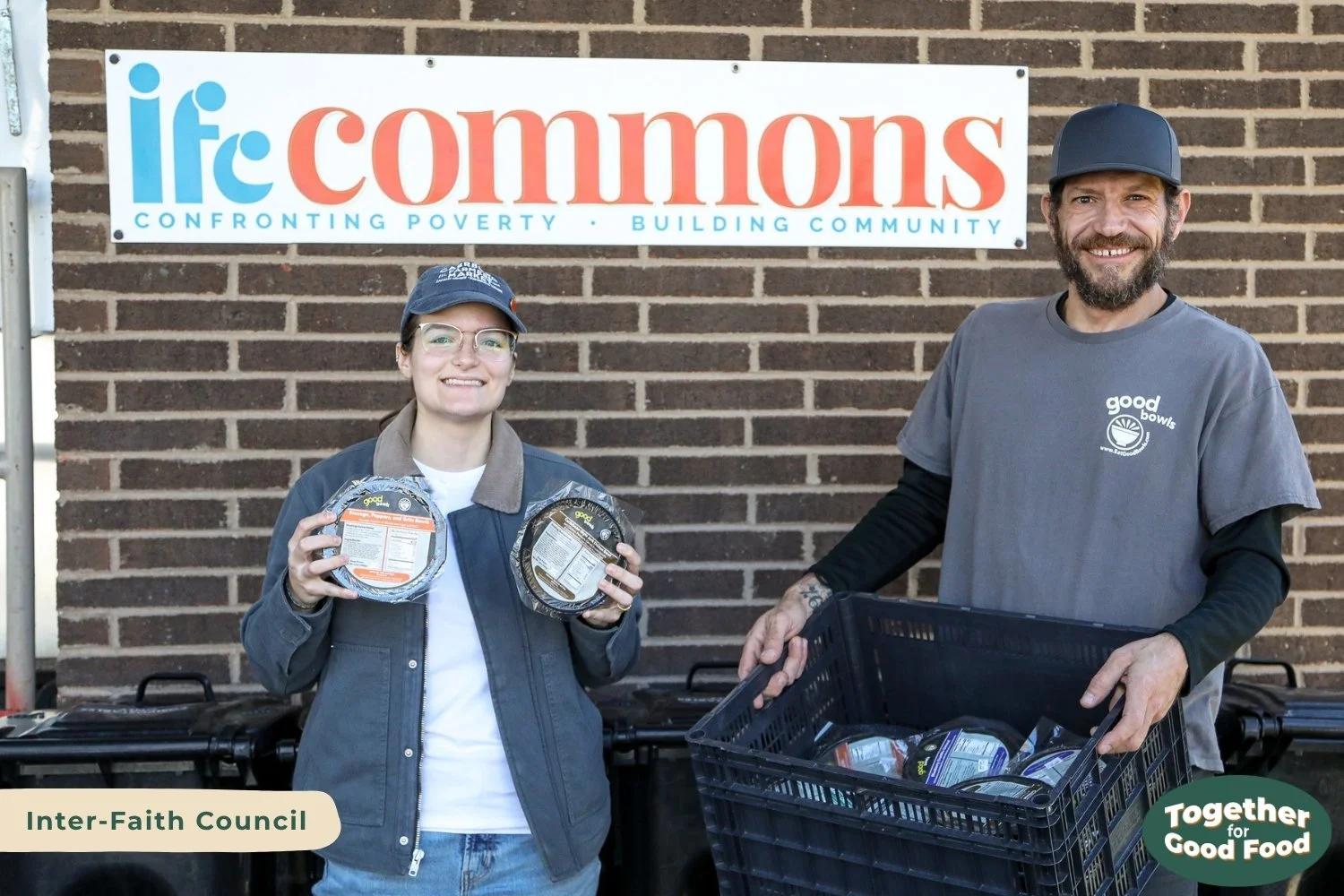 Tori Wierzchowski of Food Equity Collaborative and Steve Navarra of Equiti Foods standing in front of the Inter-Faith Council Commons sign. Tori holds two Good Bowls and Steve holds a crate full of Good Bowls. 