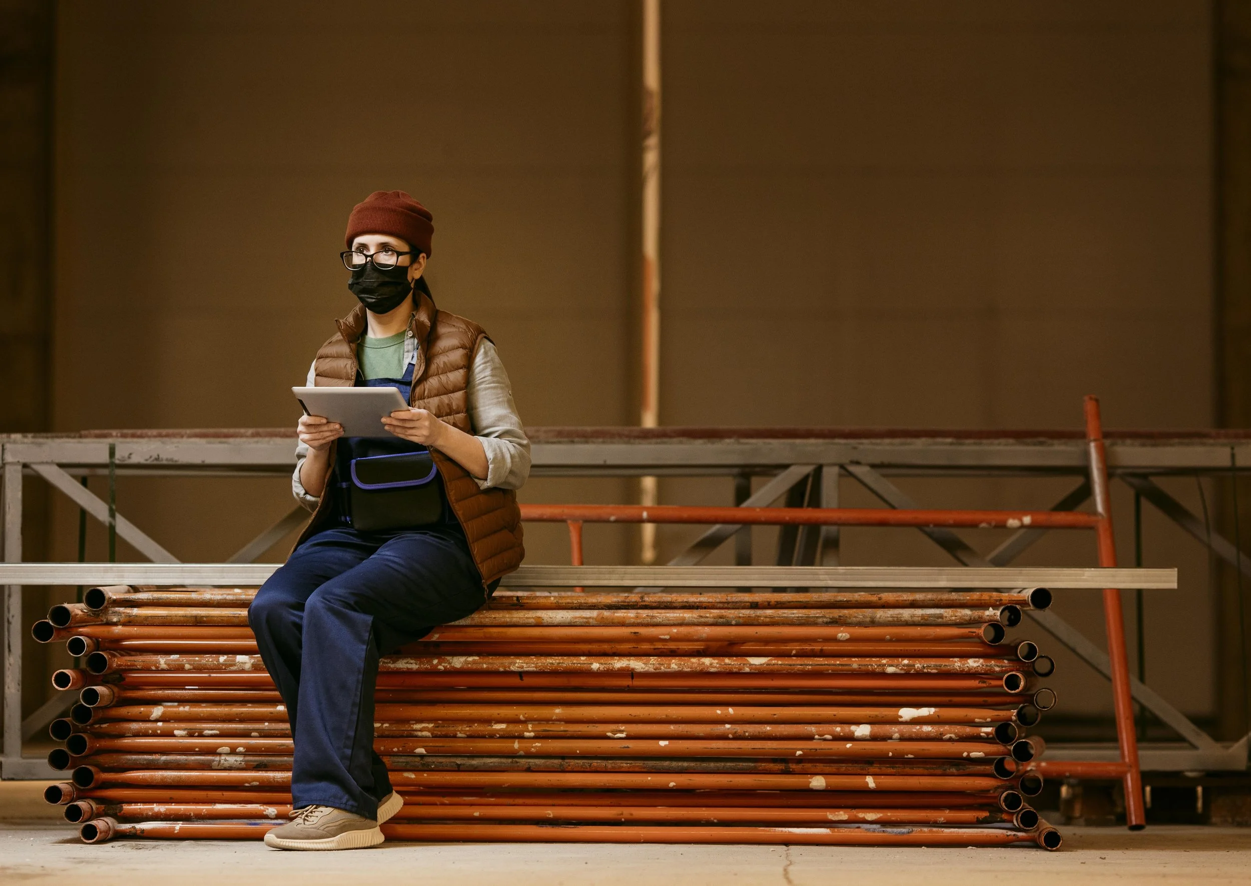 full-shot-woman-holding-tablet.jpg
