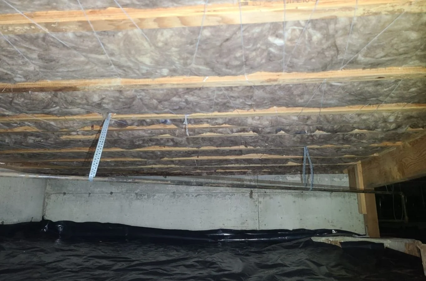 House Crawlers Home Performance & Insulation crew improving crawl space insulation in Federal Way, WA