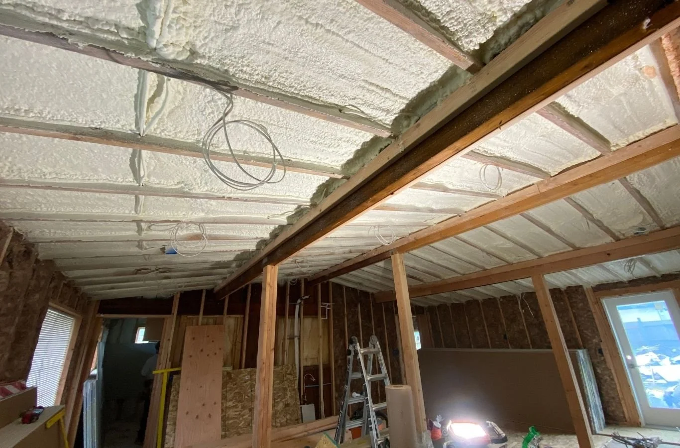House Crawlers Home Performance & Insulation crew improving crawl space insulation in Pierce County, WA
