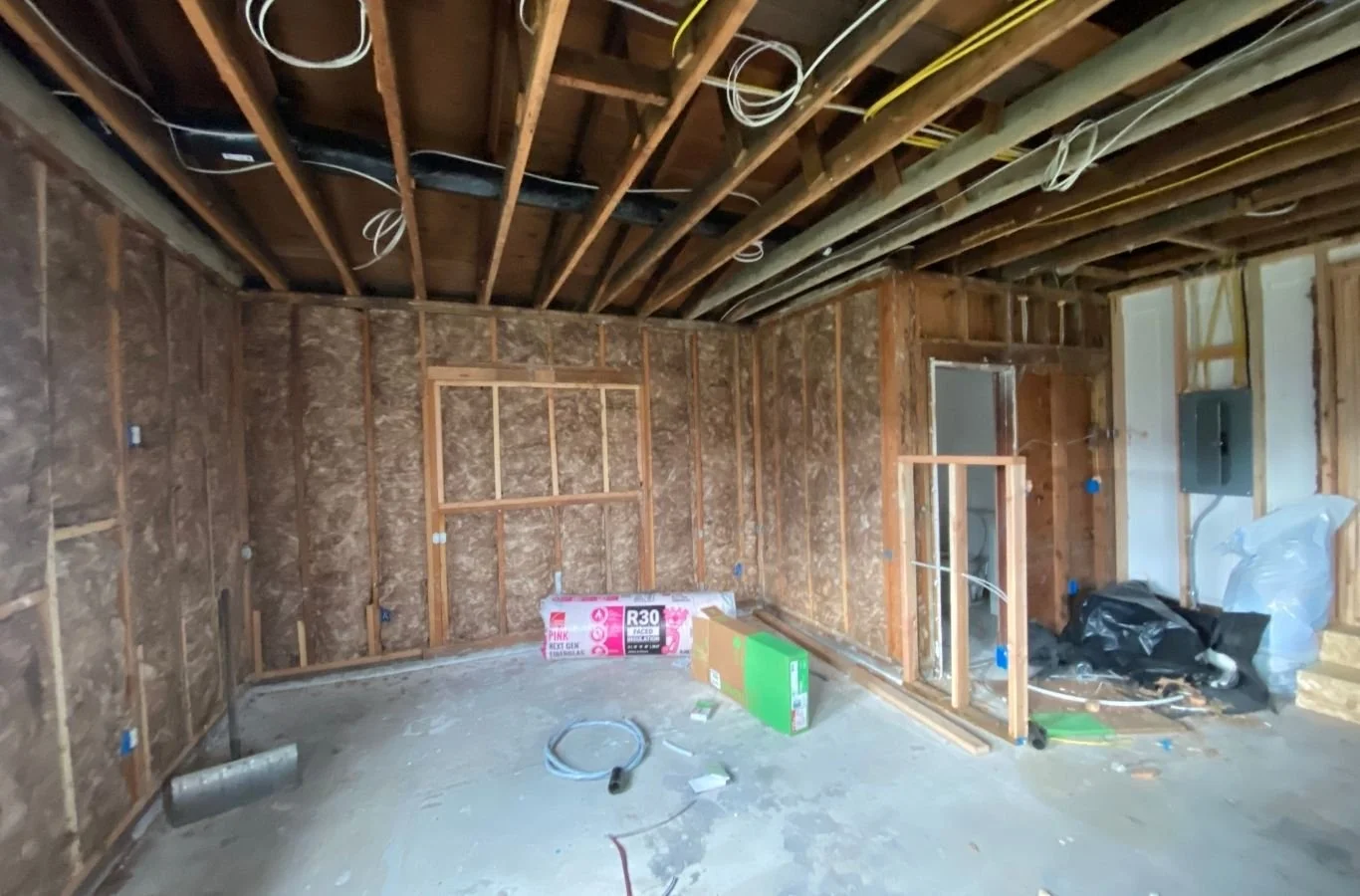 House Crawlers Home Performance & Insulation crew improving crawl space insulation in Tacoma, WA