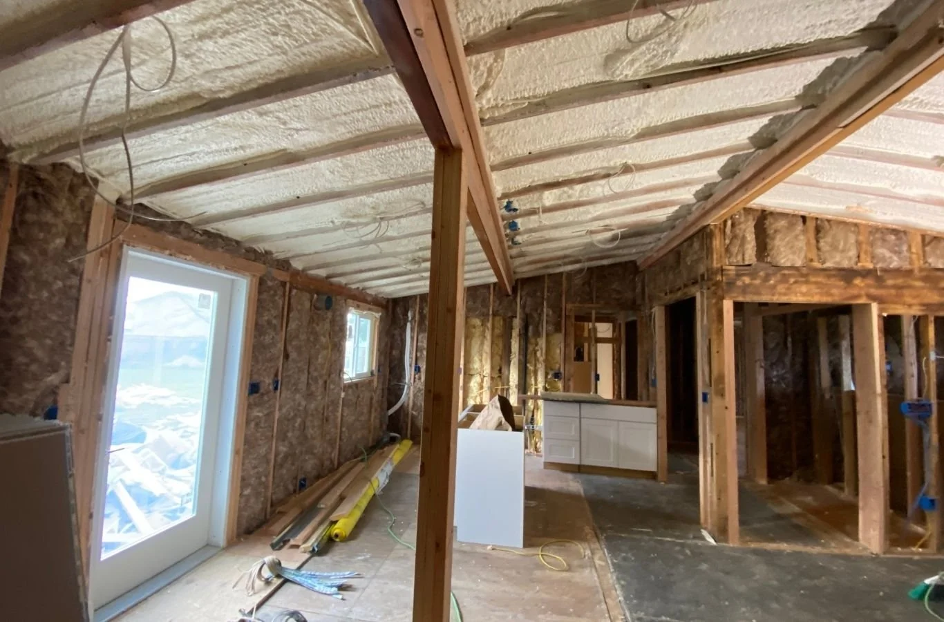 House Crawlers Home Performance & Insulation crew improving crawl space insulation in Gig Harbor, WA