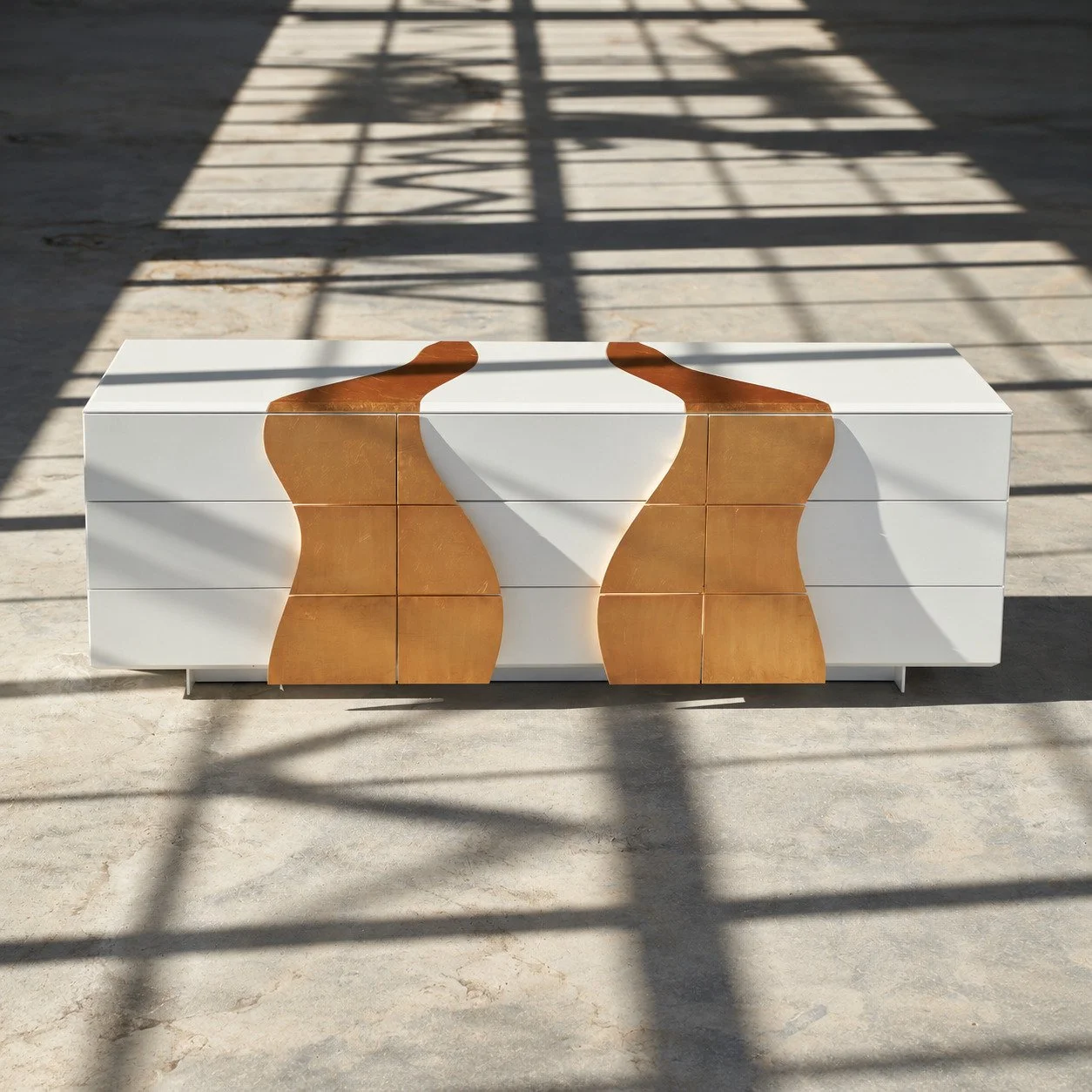 Melodious Dresser in sunlight with window shadows