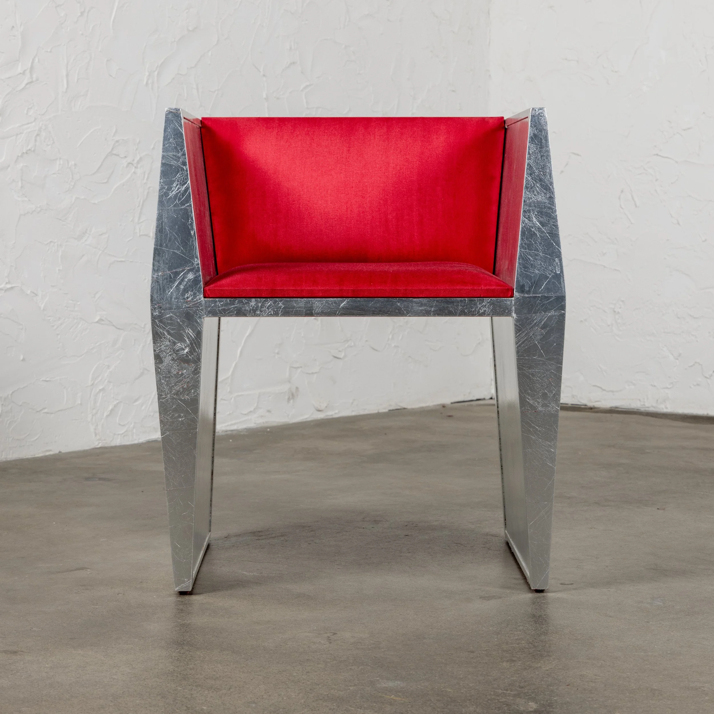 Sapience Chair - Iteration V by Nersi Nasseri: Front view with red fabric upholstery