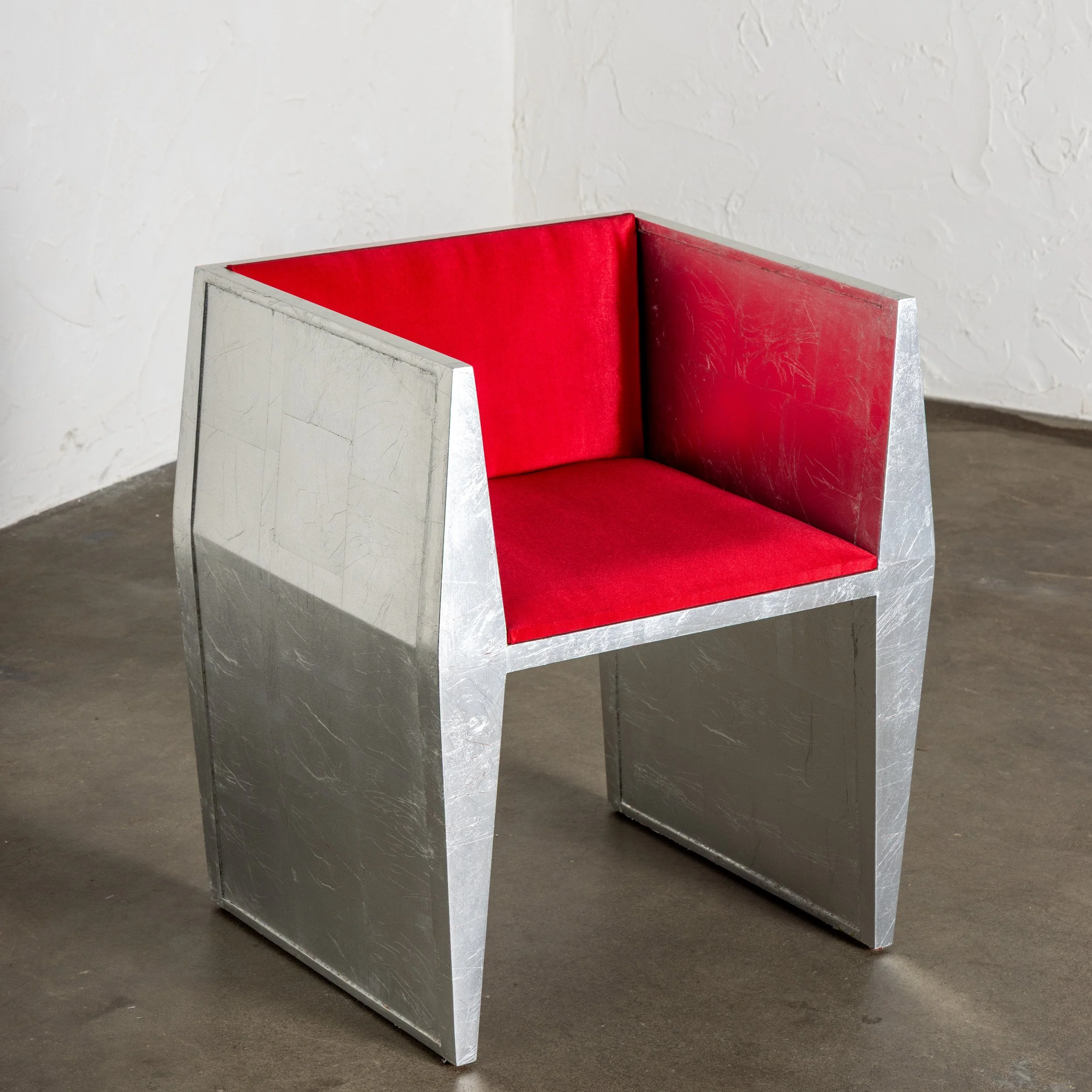 Sapience Chair - Iteration V by Nersi Nasseri: Three-quarter view of silver leaf silhouette