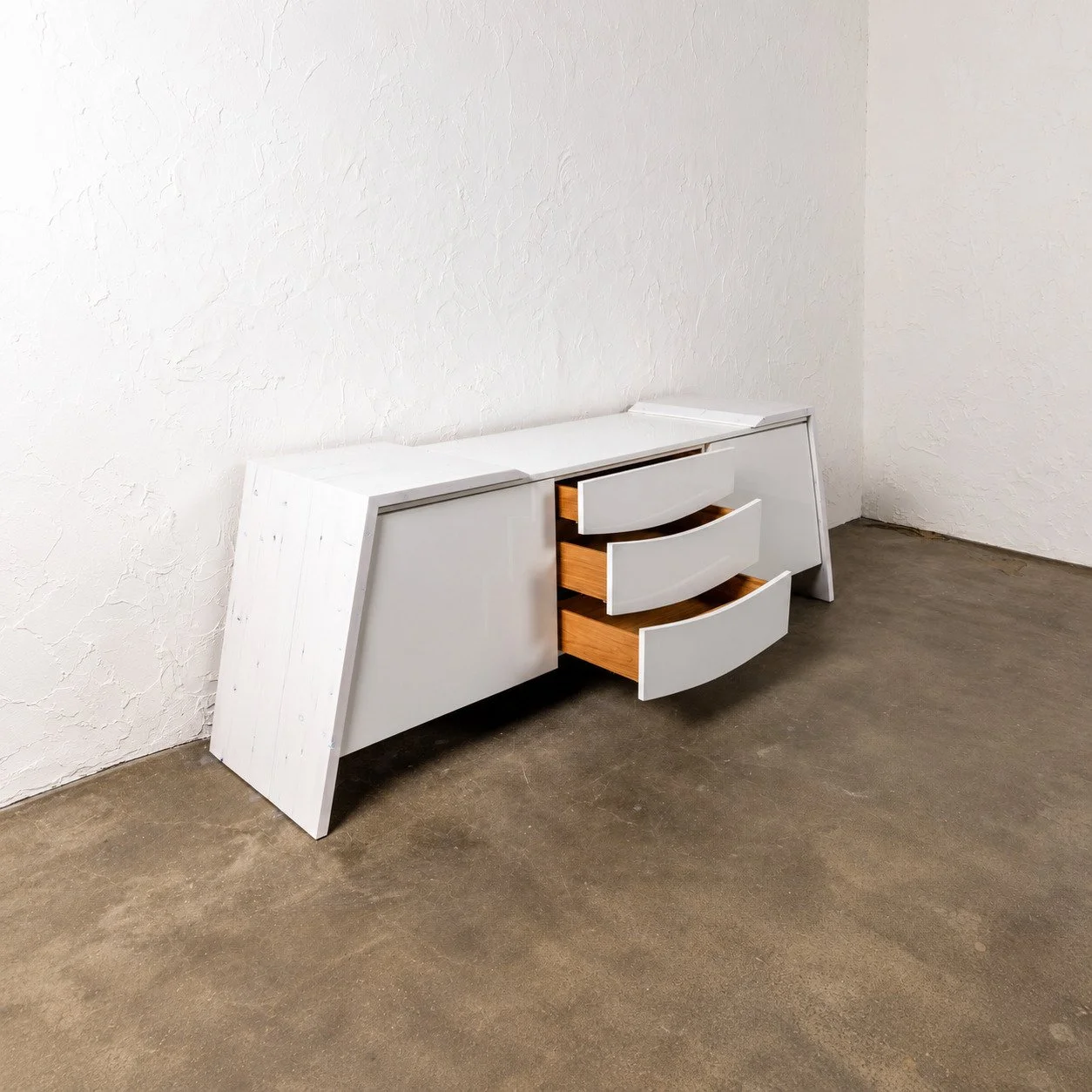Luxor Credenza - Iteration V by Nersi Nasseri: Open curved drawers with wood interiors