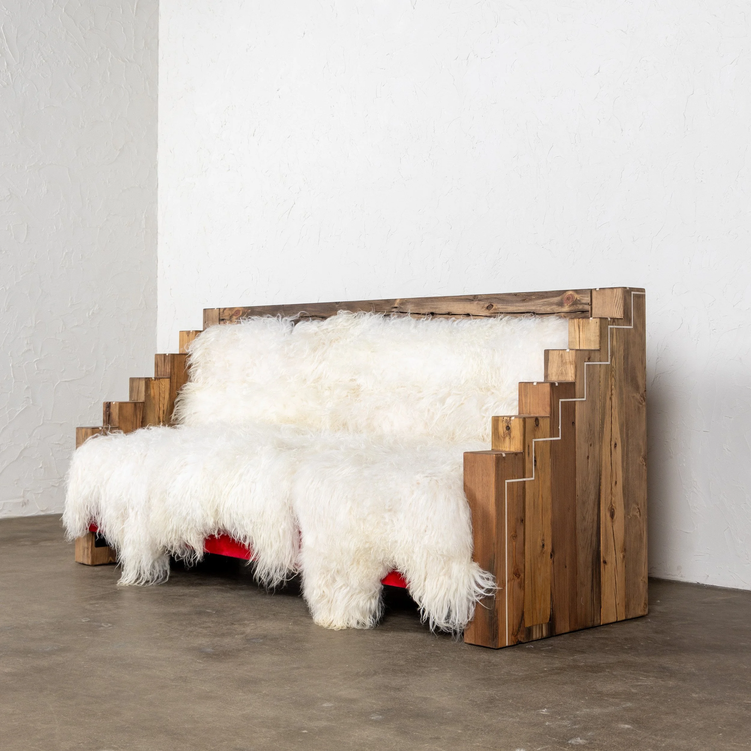 Peldaño Sofa by Nersi Nasseri: Three-quarter view of stepped oak sofa