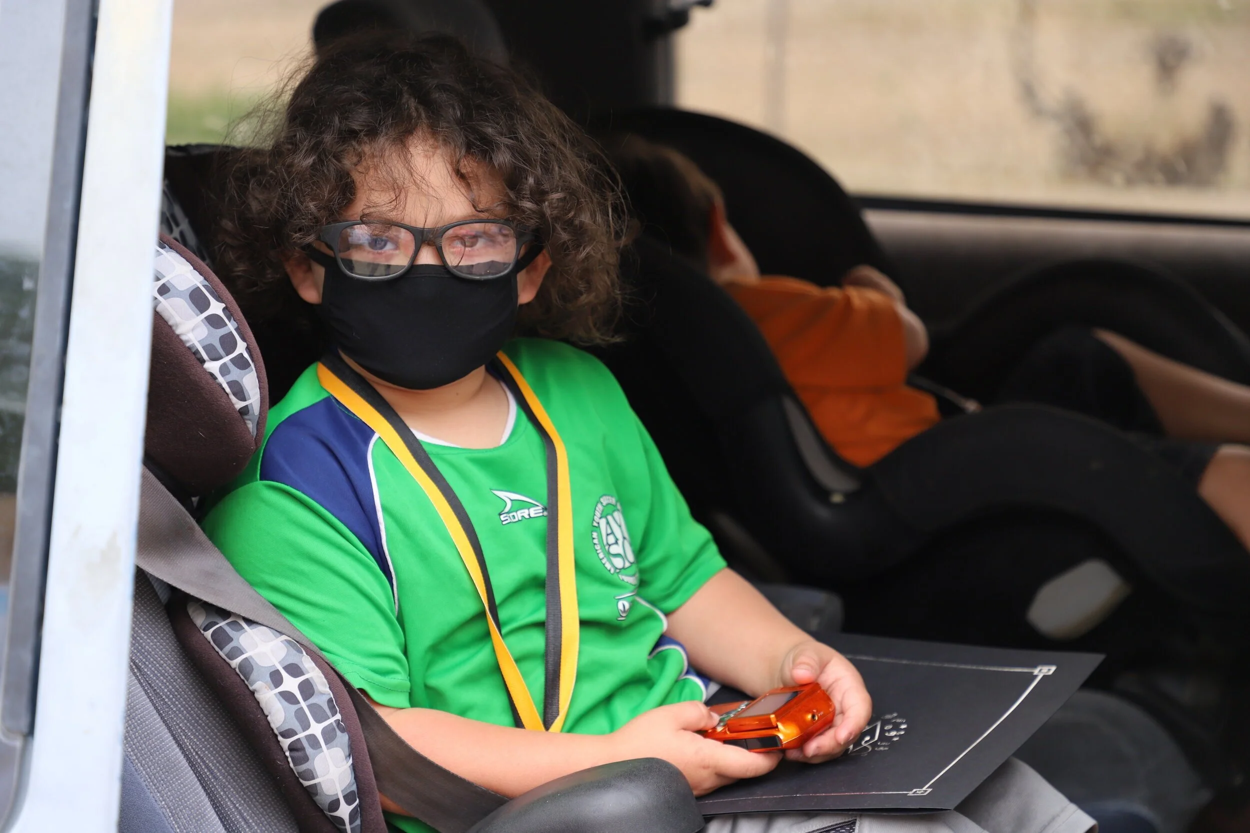  David posed for a picture after he got his PreK Graduate medal 