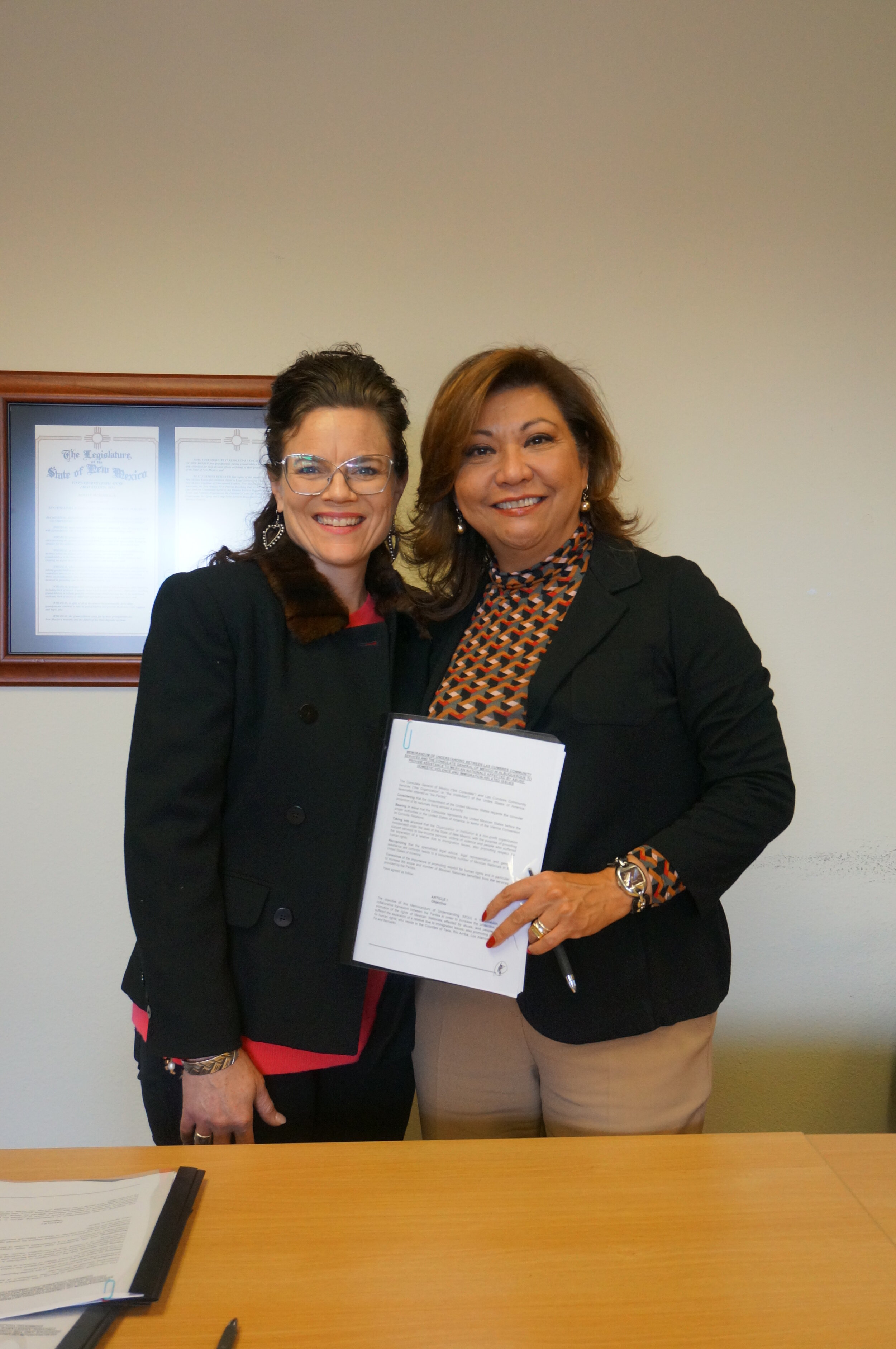 Norma and Stacey complete the signing of the MOU