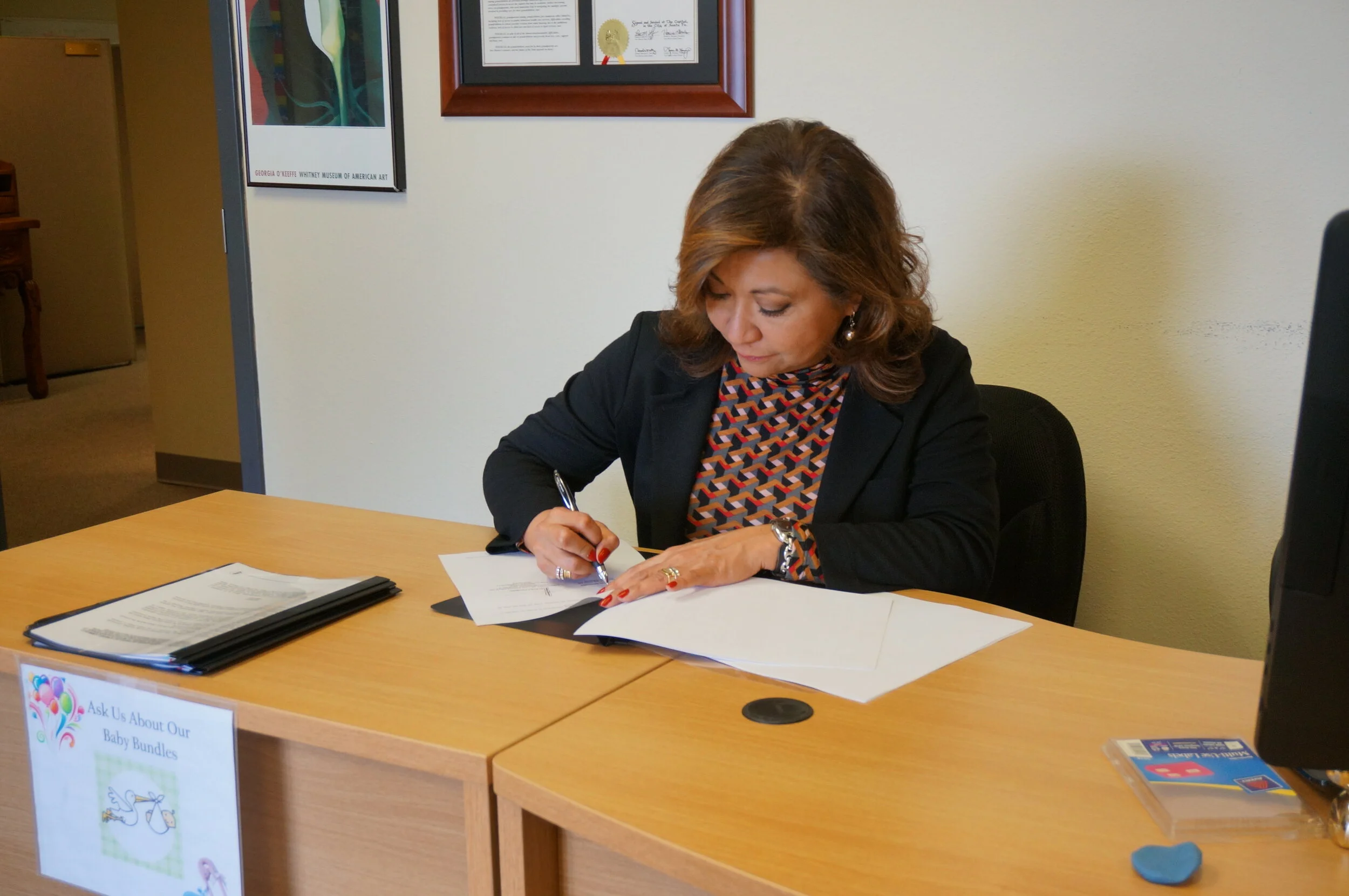 Norma Ang Sanchez signs MOU on behalf of the Mexican Consulate