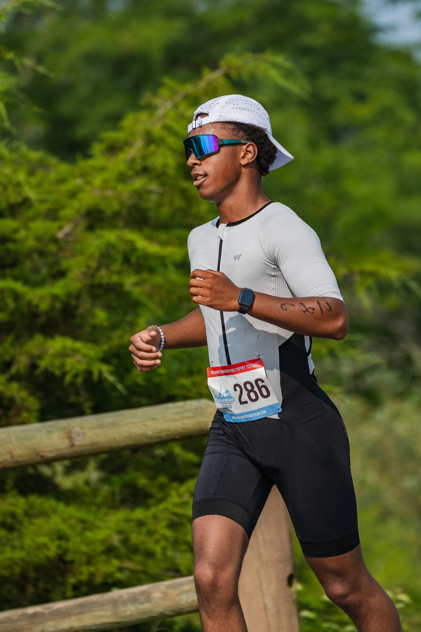 Young man racing in a triathlon