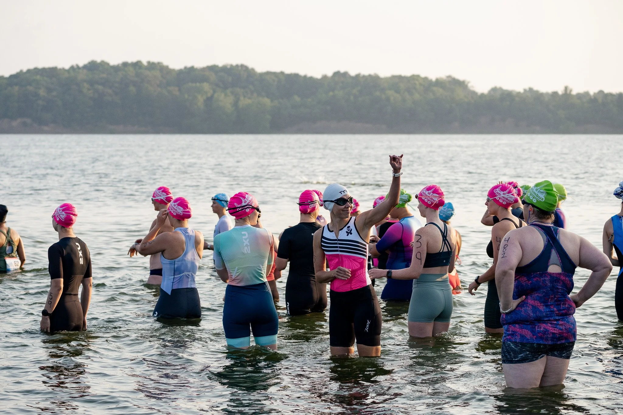Female swimmers starting a triathlon 