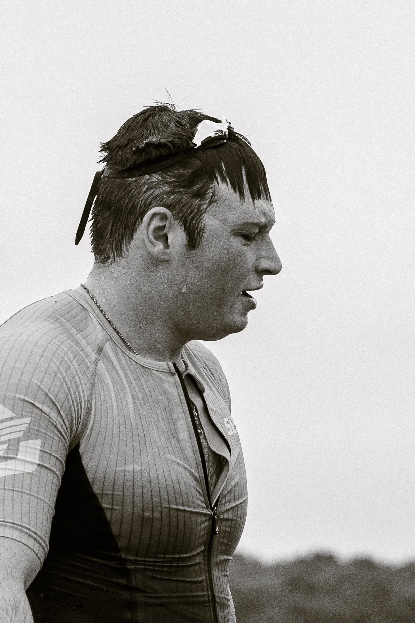 Profile of male triathlete exiting the swim